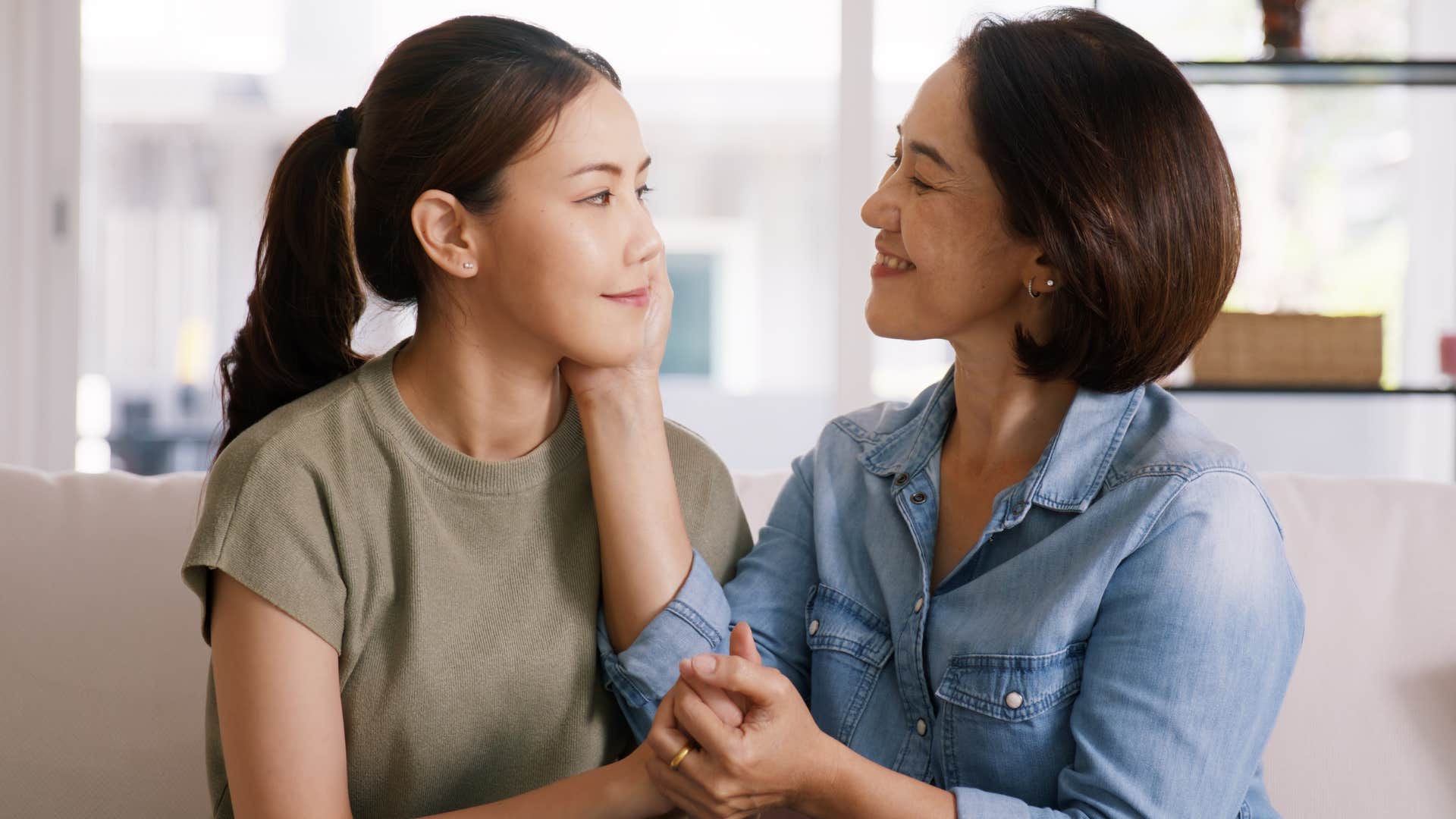 Woman saying "we have different opinions and that's okay" to her mother.