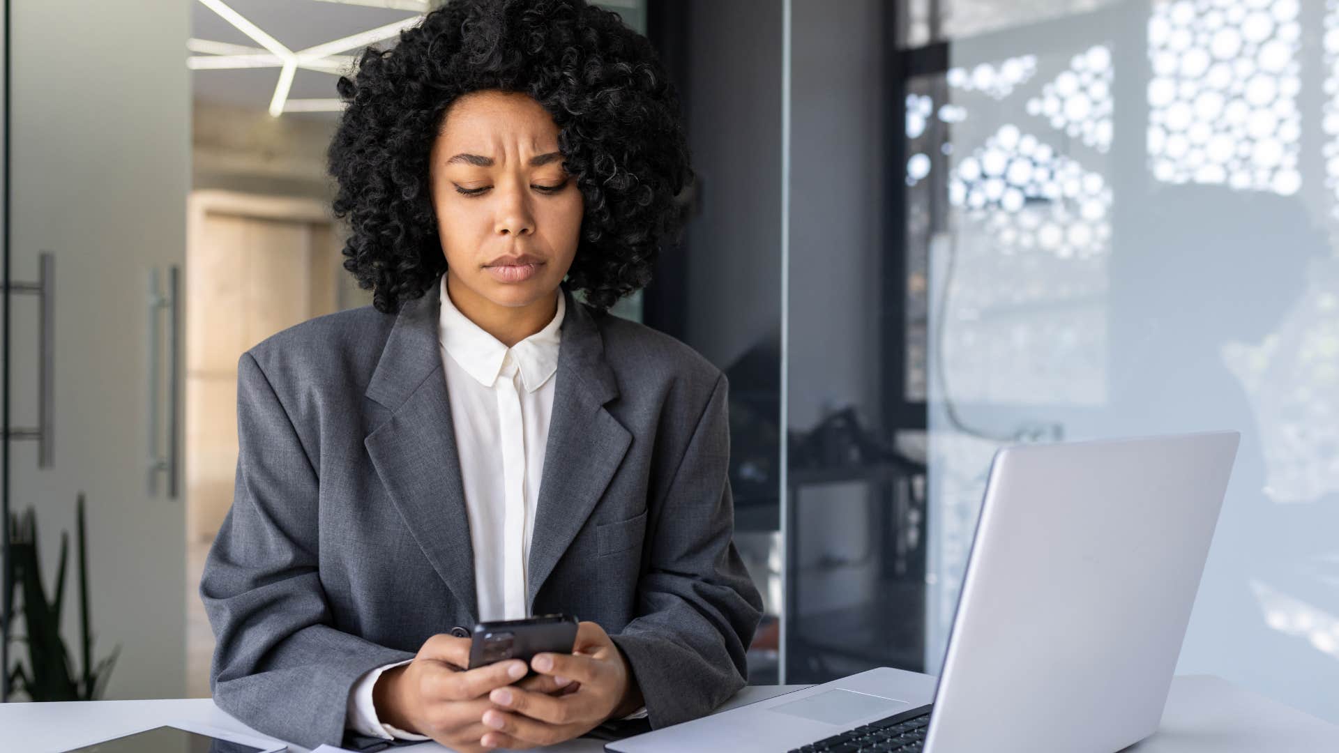 woman texting that's not my job at work