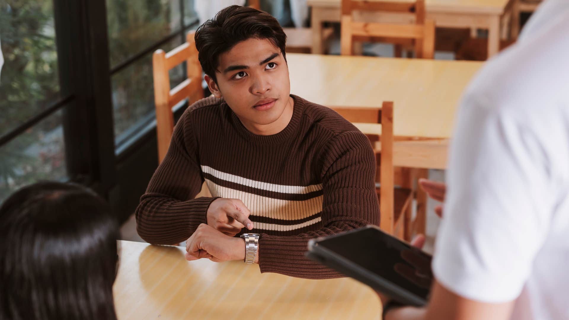 rude entitled man telling worker I want to speak to your manager