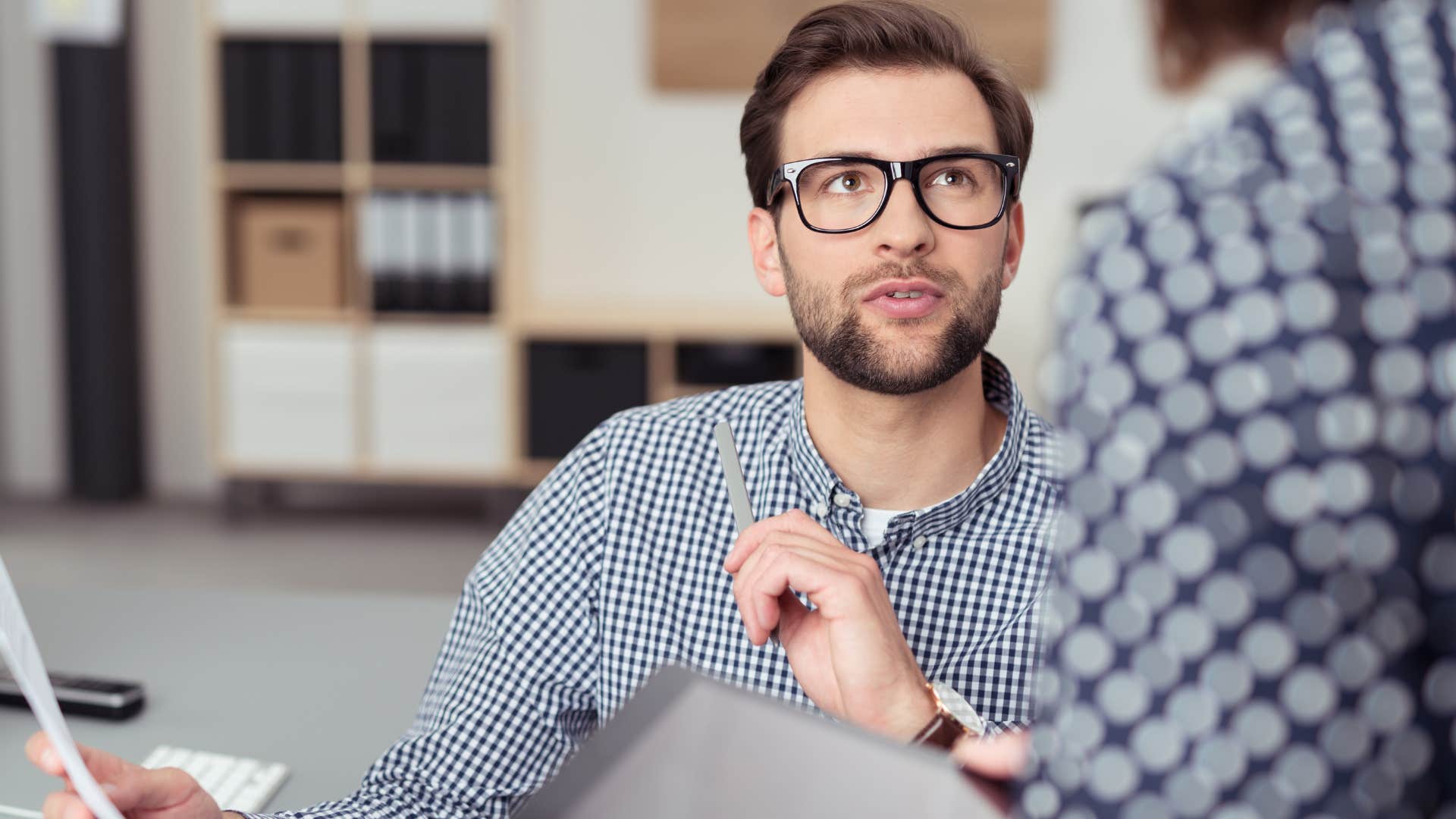 spoiled man telling co-worker you need to fix this