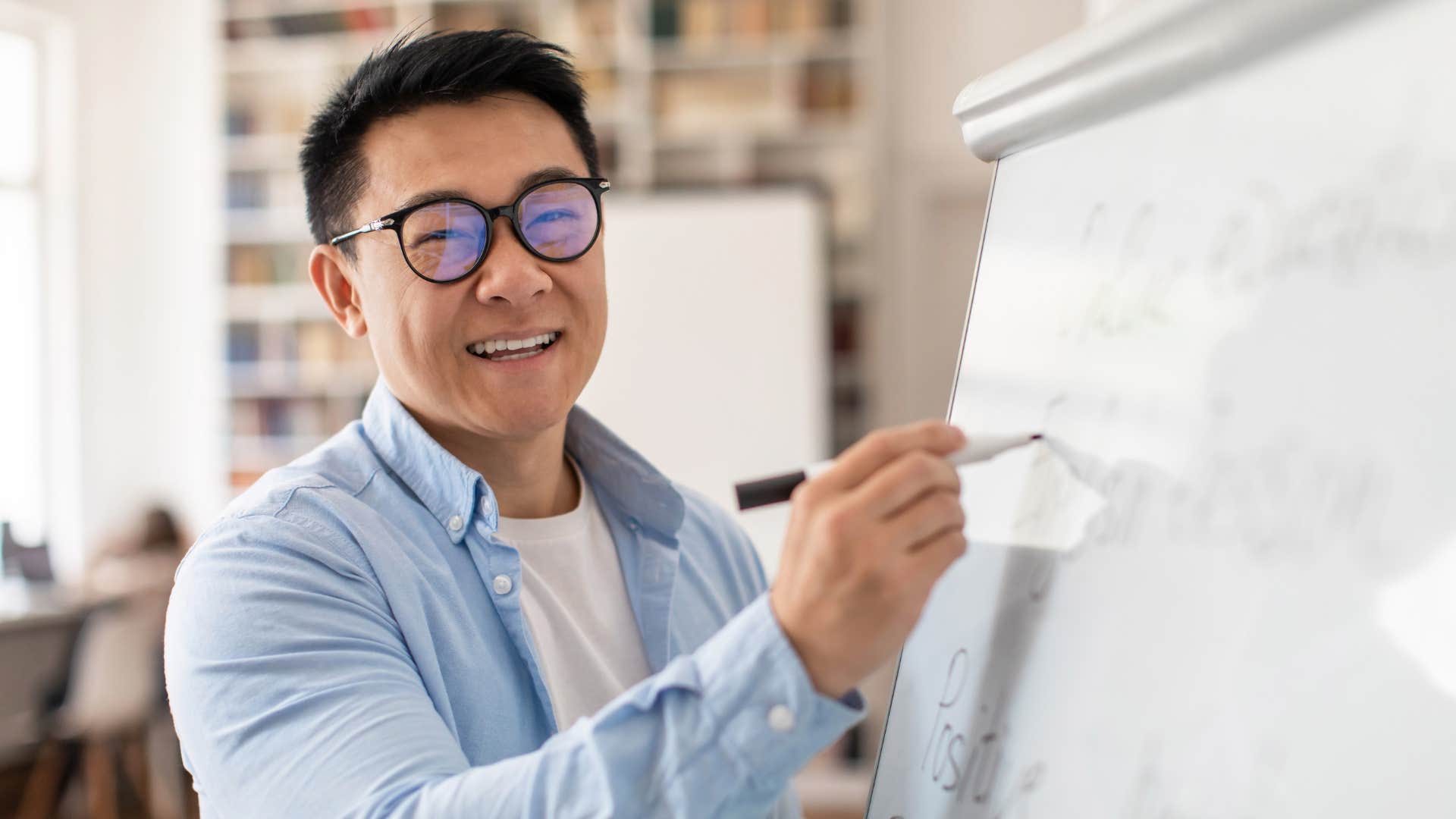 man teaching trichotomy property math for class