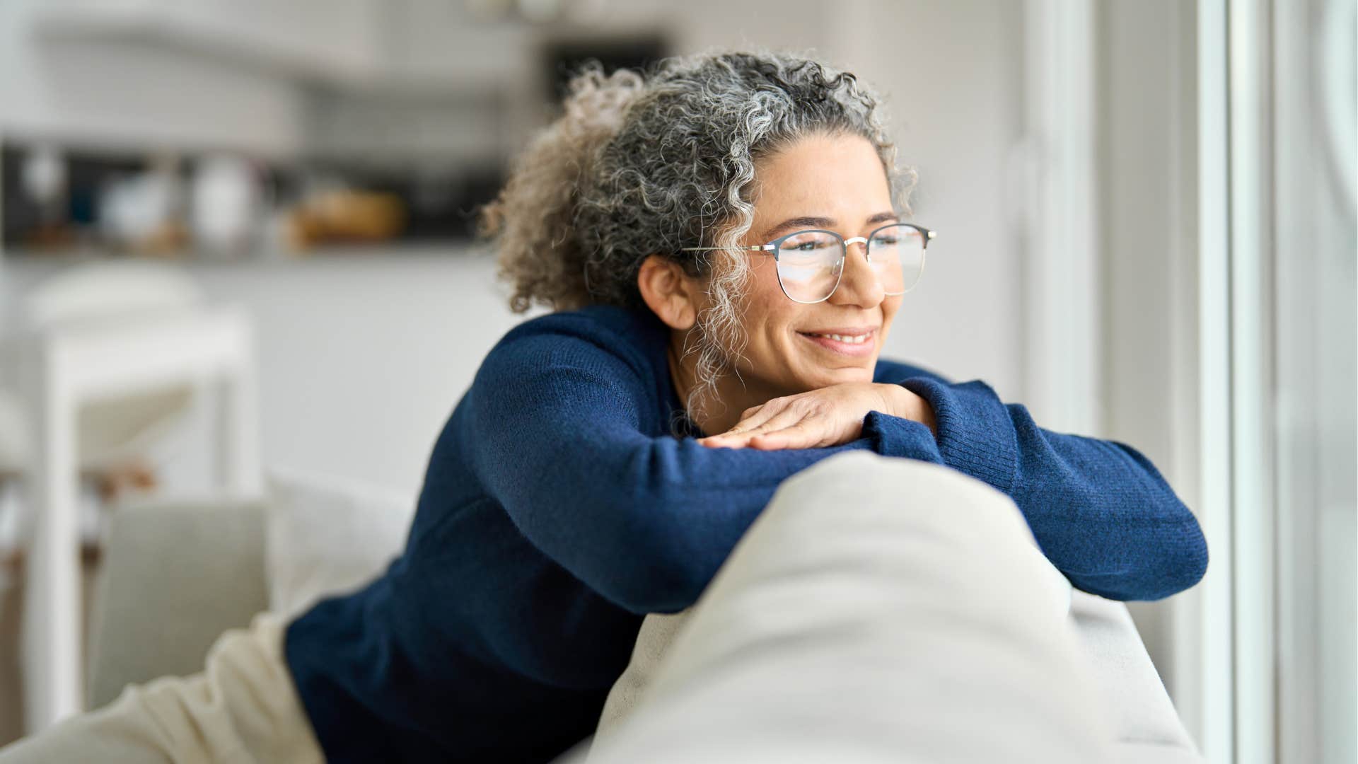 Person on couch after breakup to get over it quickly