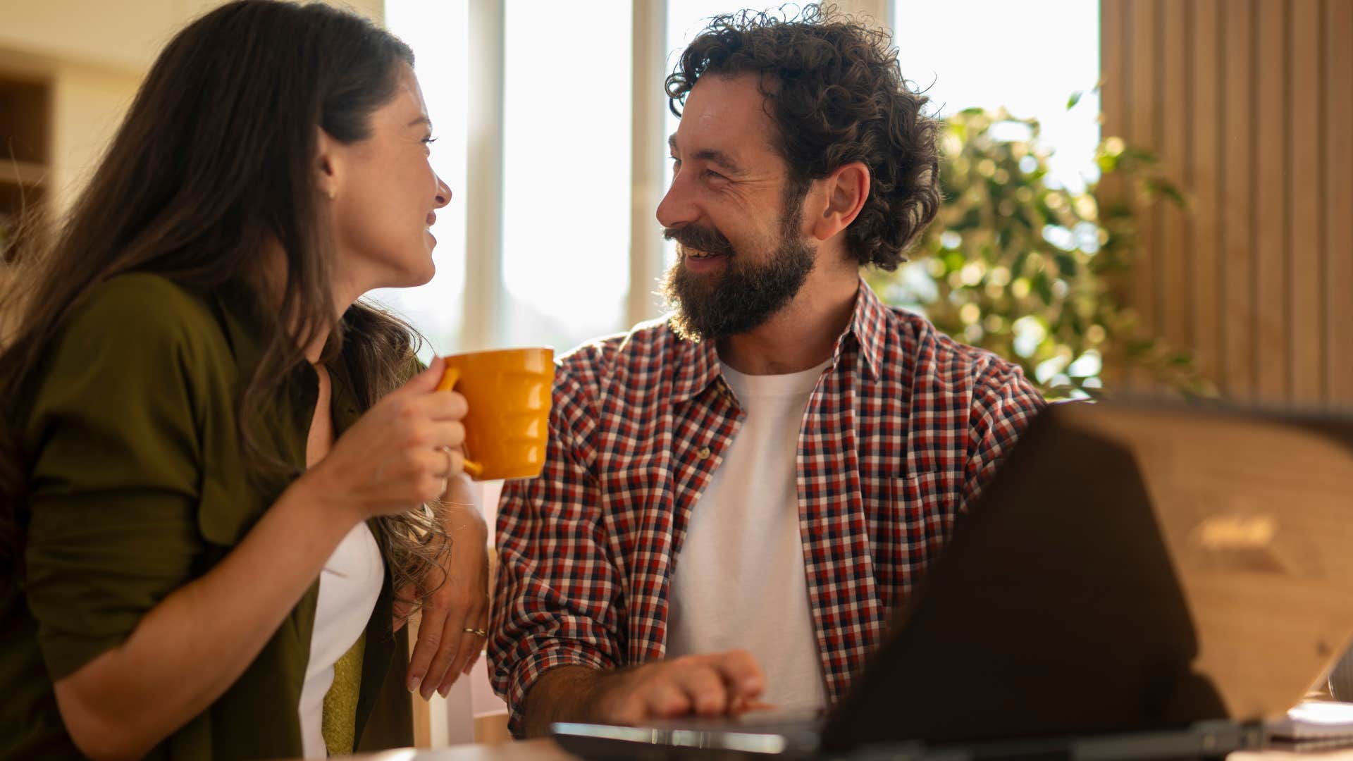 couple communicating easily smiling at each other
