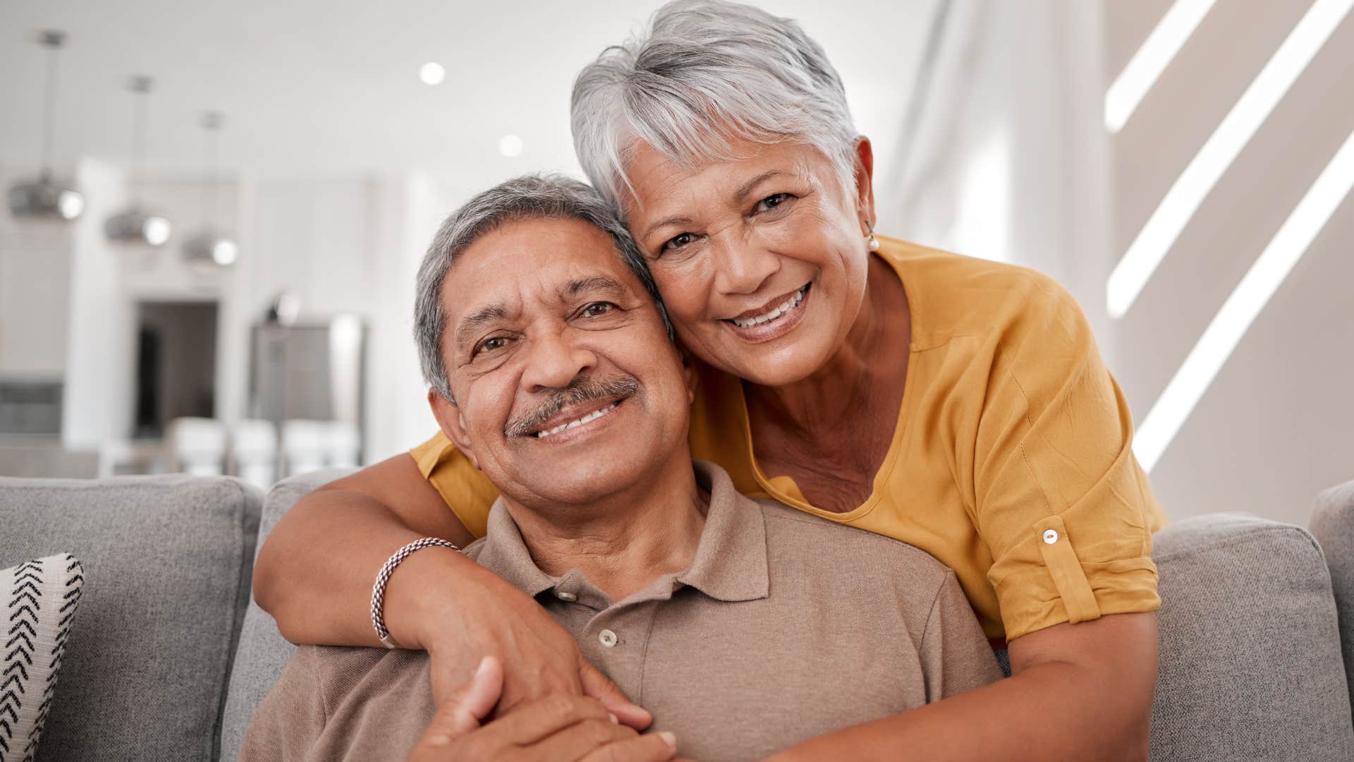 woman showing husband affection and smiling