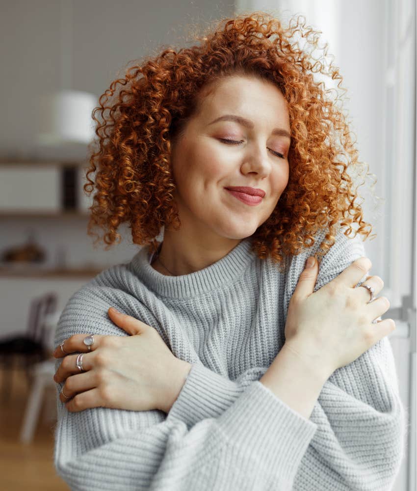 Person embraces themselves