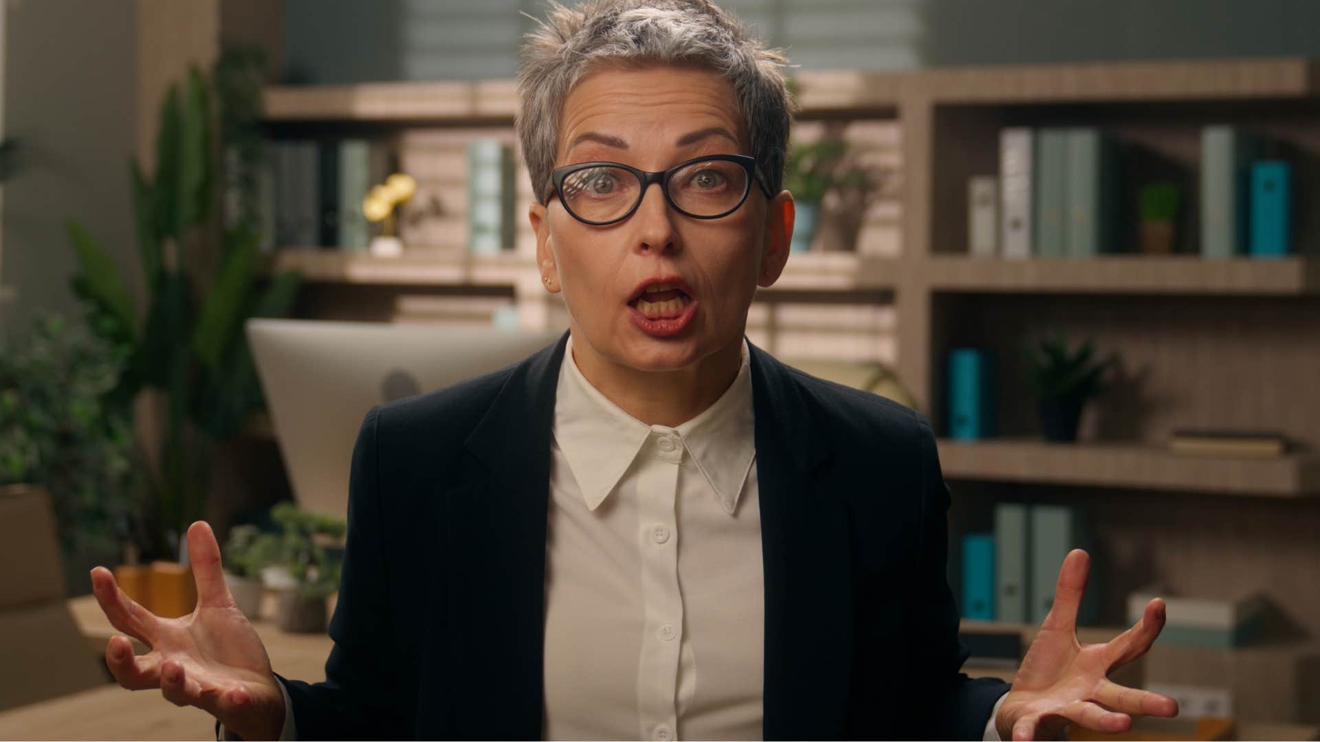 Woman arguing about work ethic in an office.