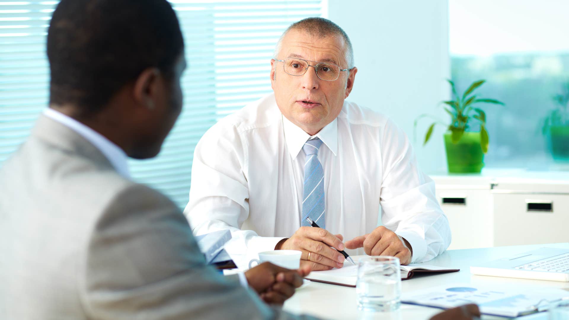 older boss telling new employee they dont have job descriptions there