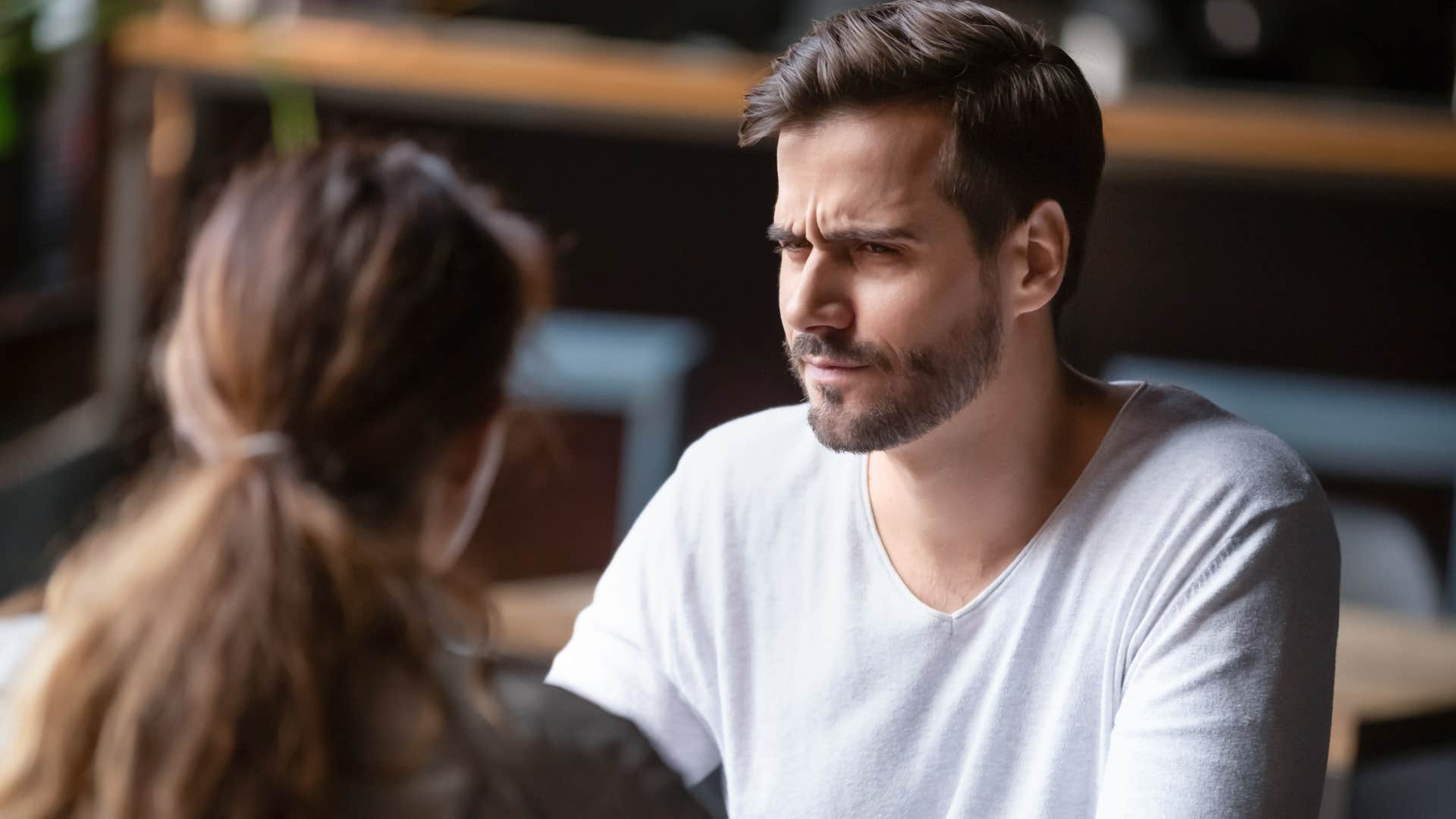 confused man over-analyzing his partner's words