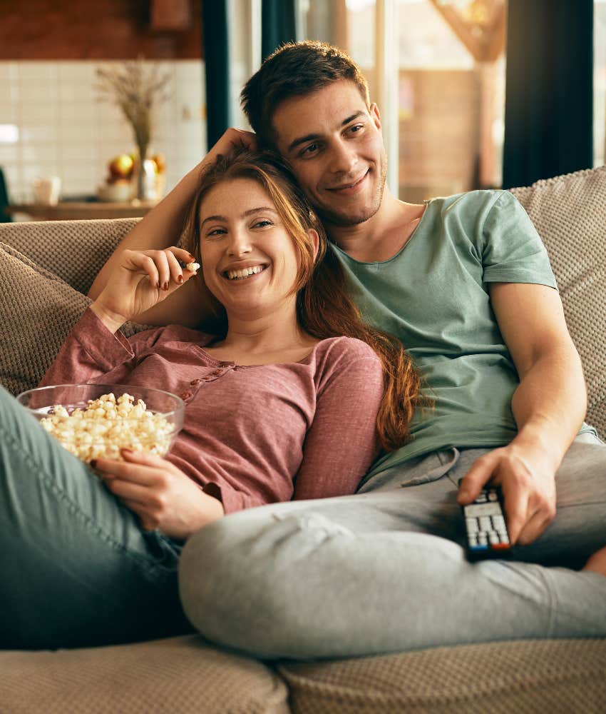 couple watching tv to relax together