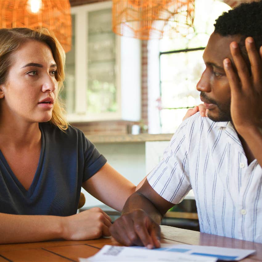married couple who will build wealth together having a sit-down conversation