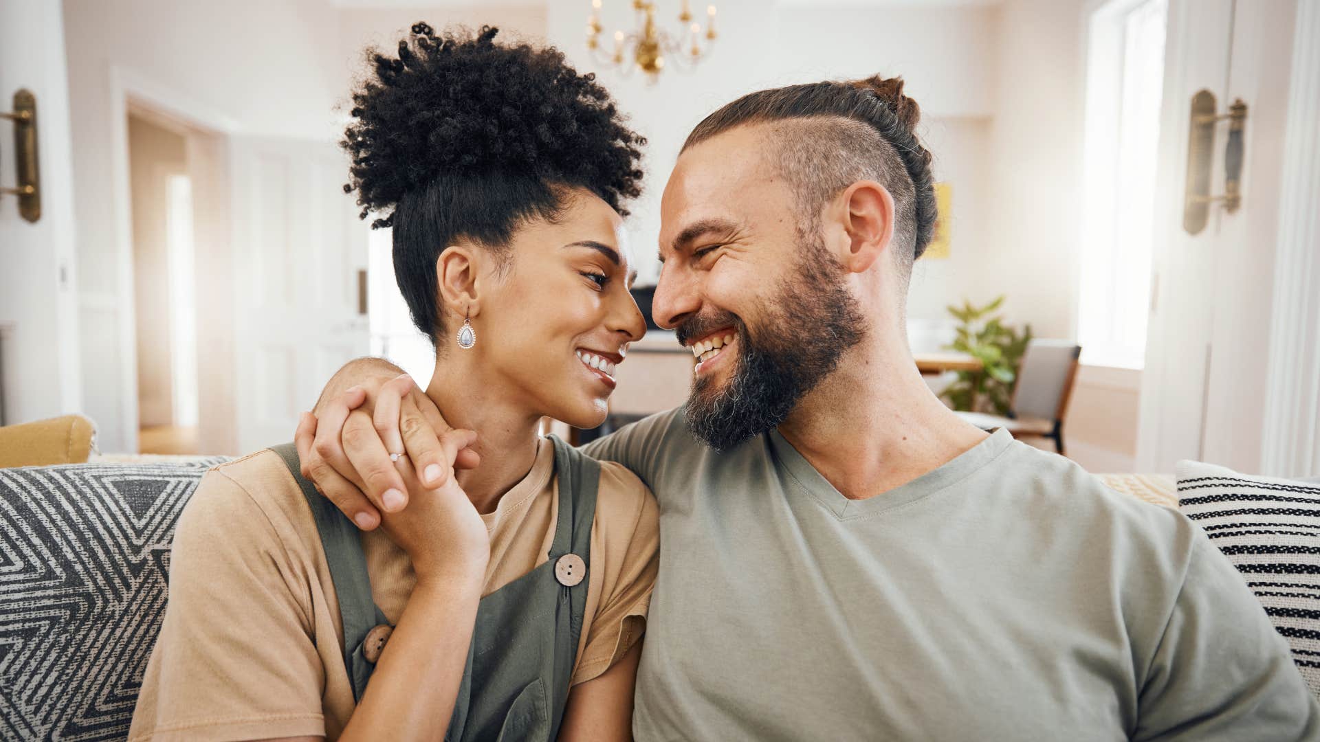committed couple smiling with each other
