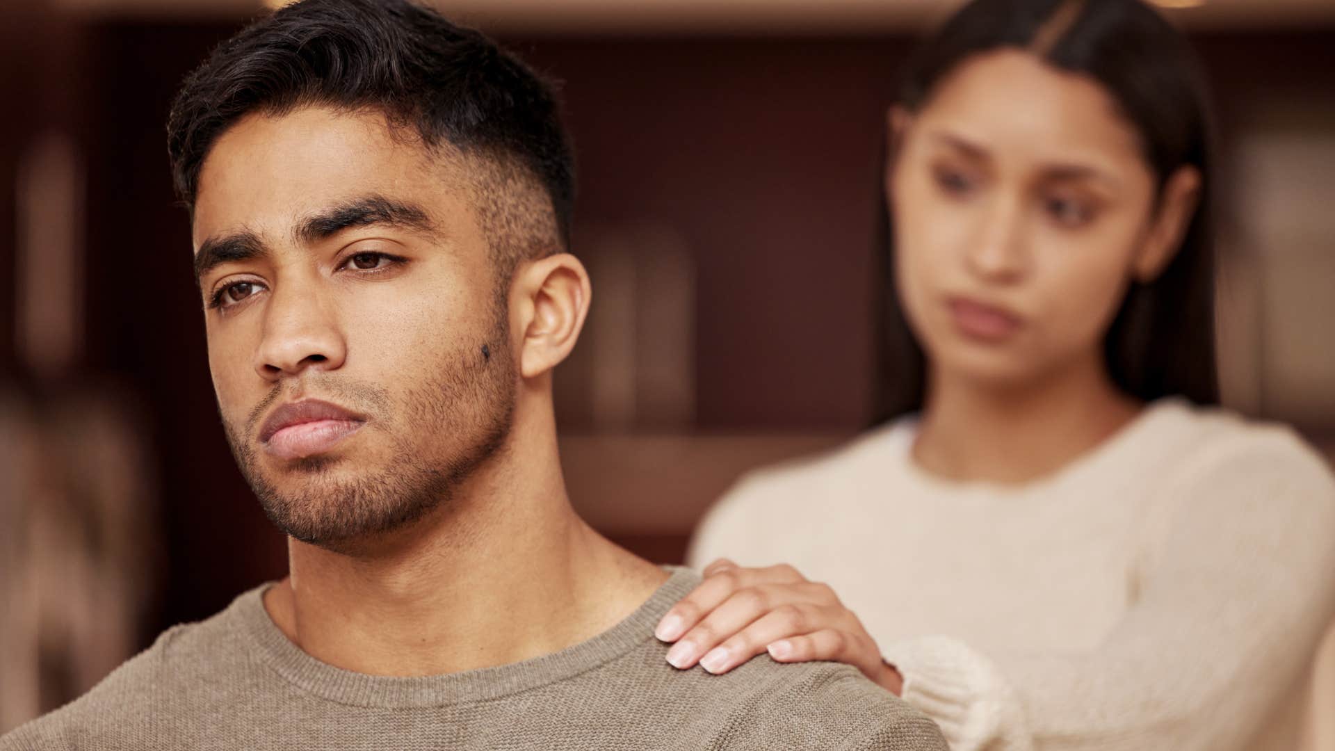 Woman comforting her husband who feels like an obligation.