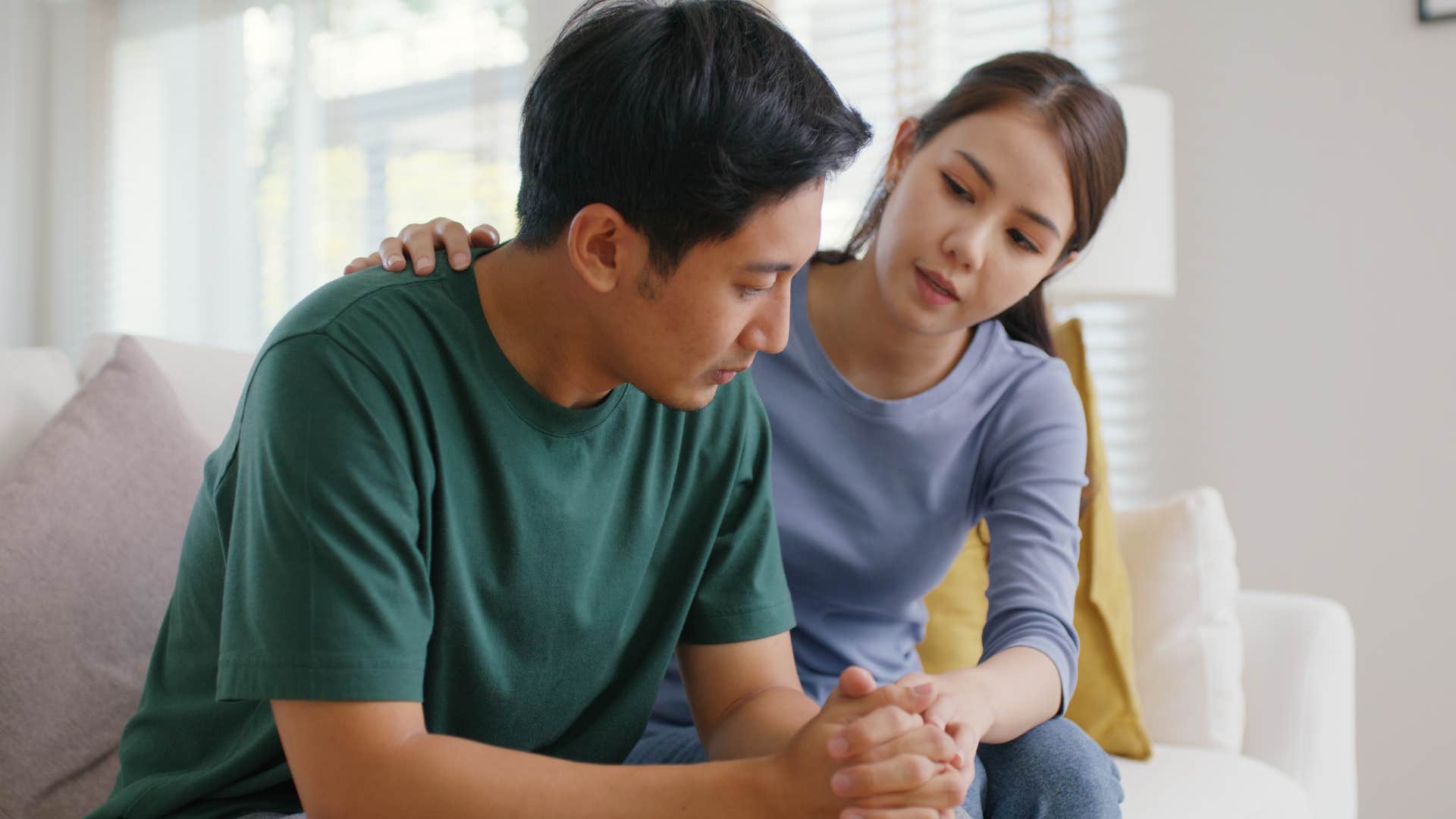 Woman who's walking on eggshells comforting her partner.
