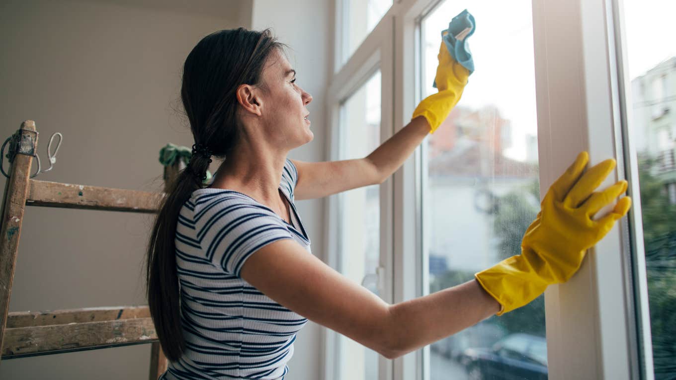 day week clean house impacts money flow woman cleaning house day week impacts money flow