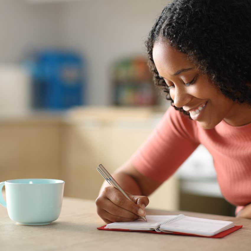woman making a decision with her journal