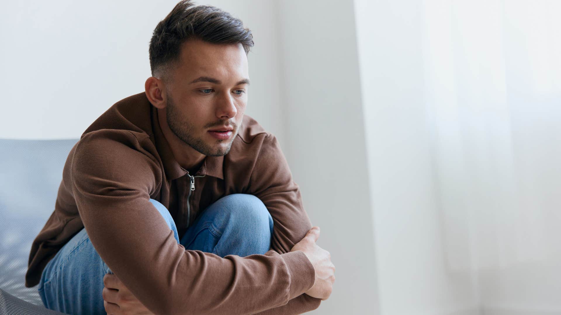 young man feeling hopeless about the future