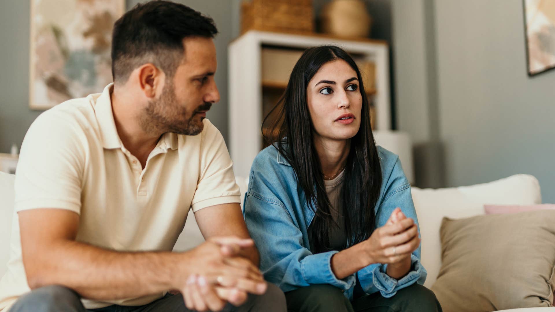 Man arguing with his wife who's been more irritable.