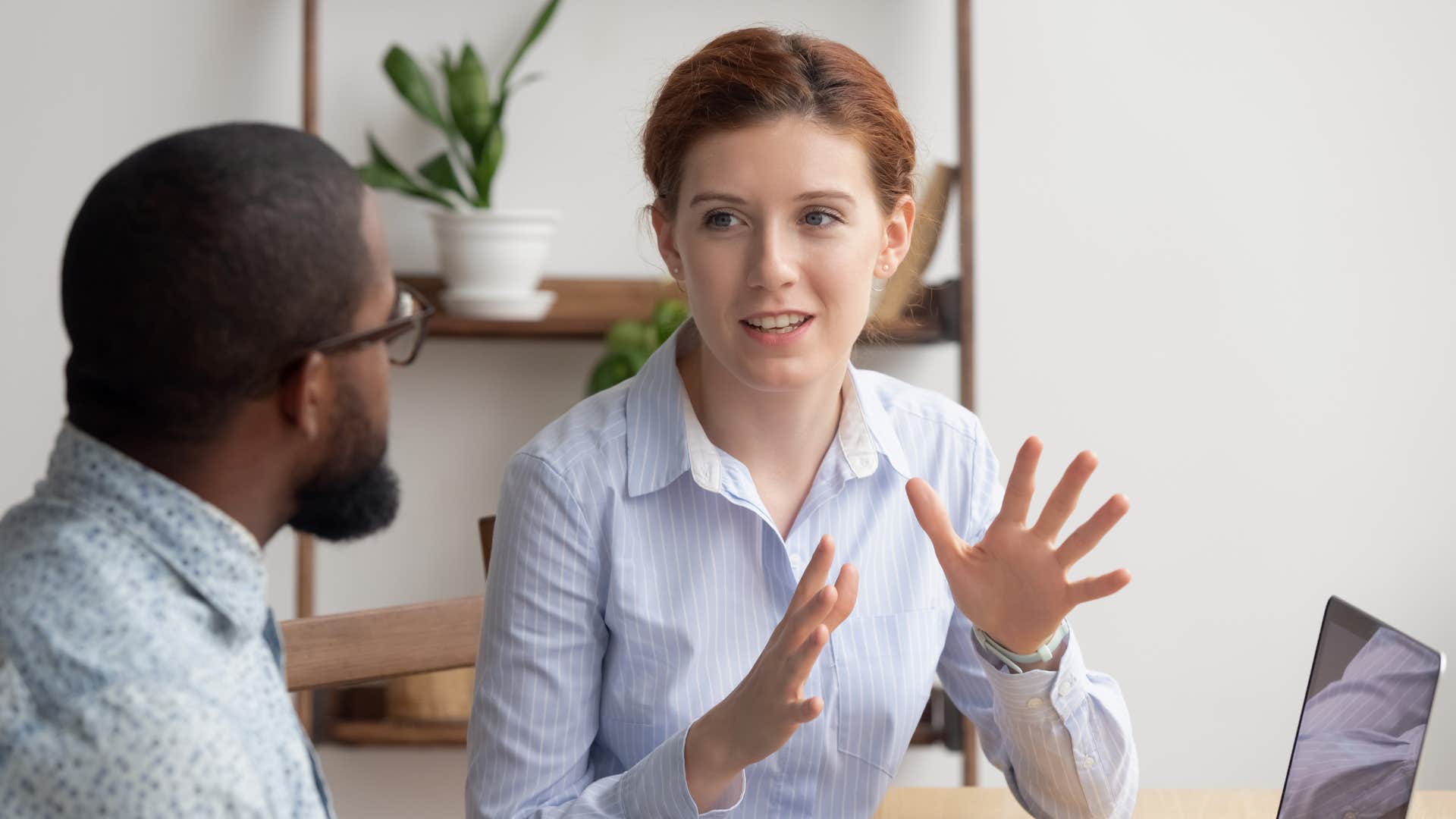 woman telling man you're missing the bigger picture