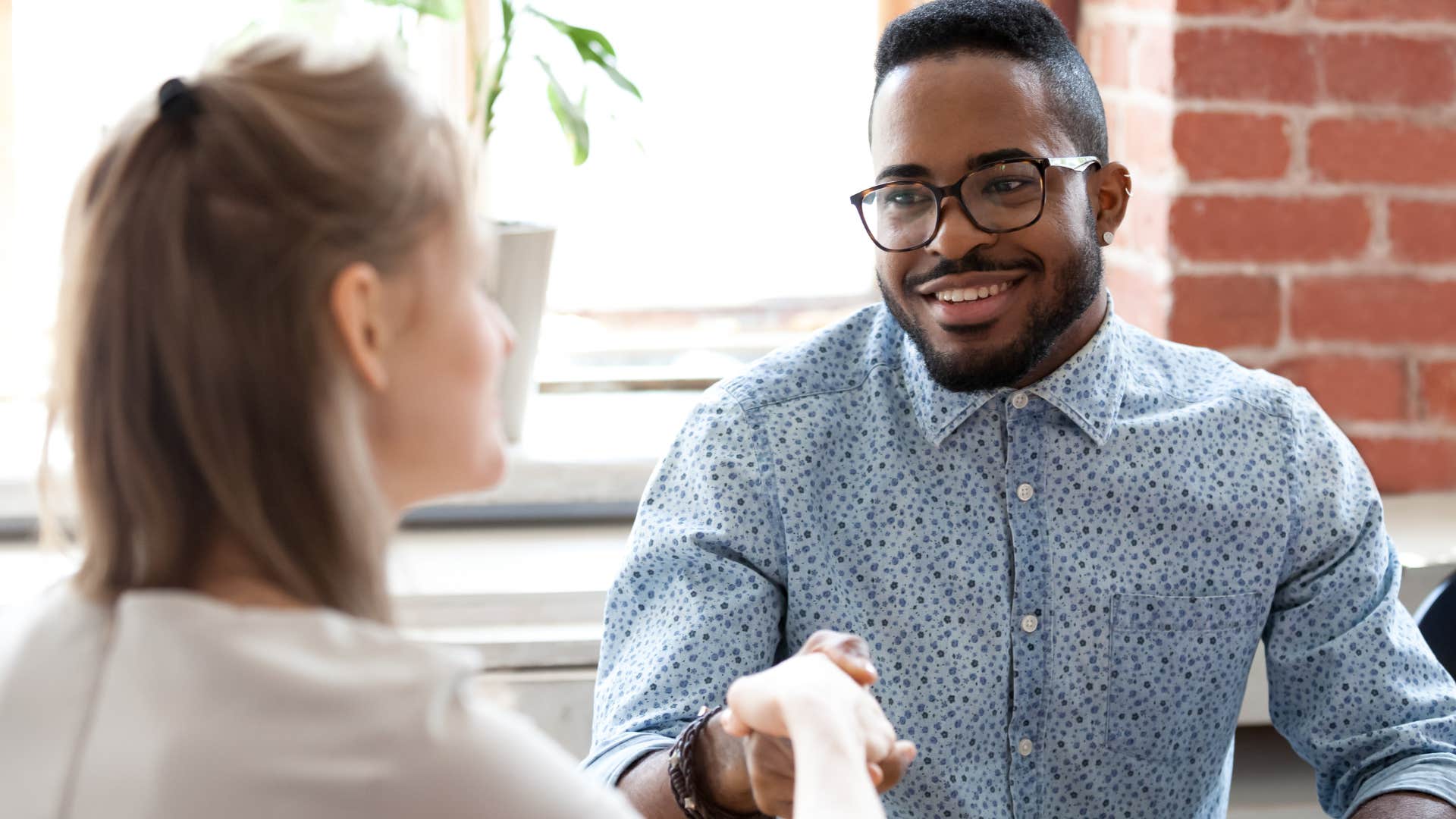 man without boundaries saying yes shaking hands