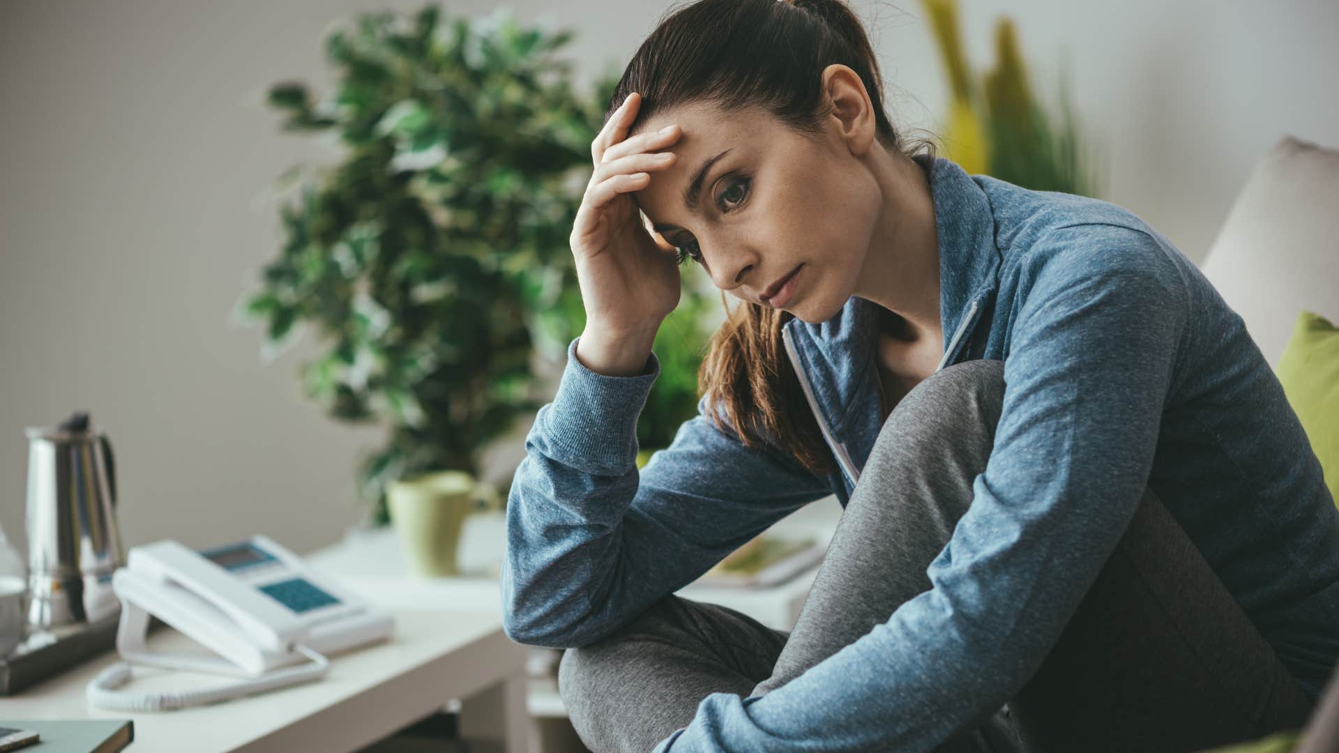 exhausted woman feeling tired at home