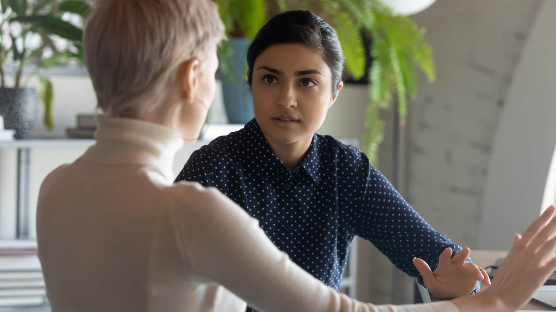 woman telling ignorant colleague I admire your confidence in the lack of knowledge