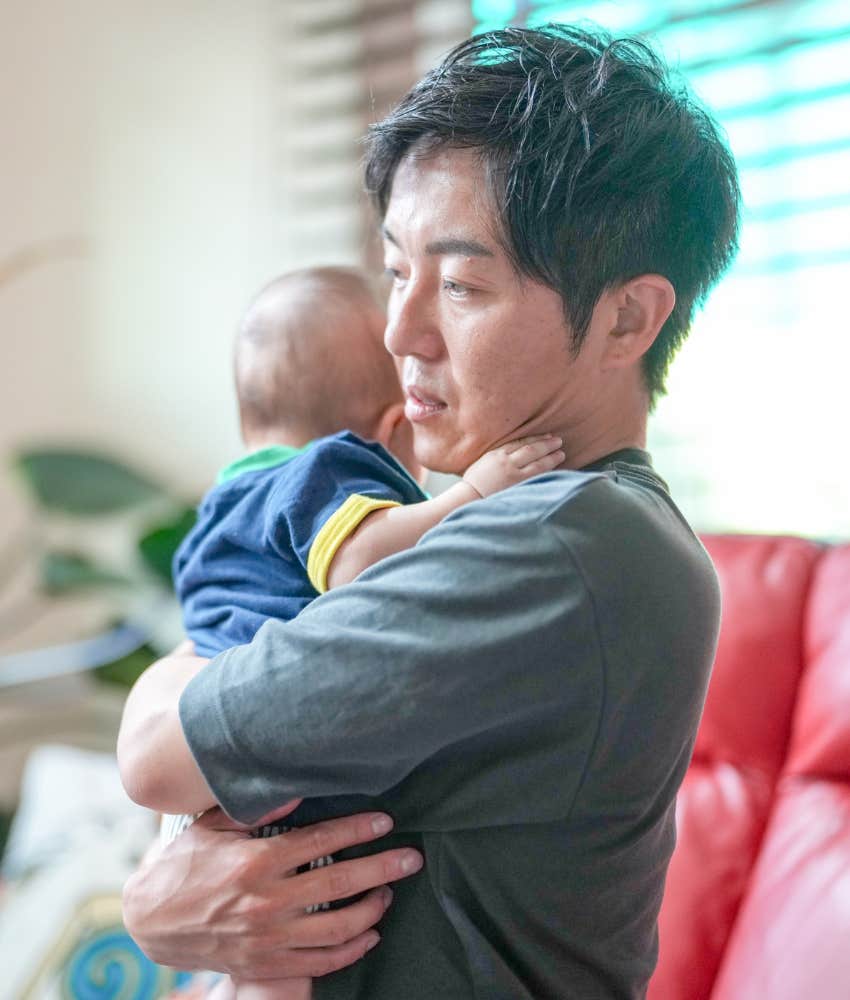 Father suffering from postpartum depression