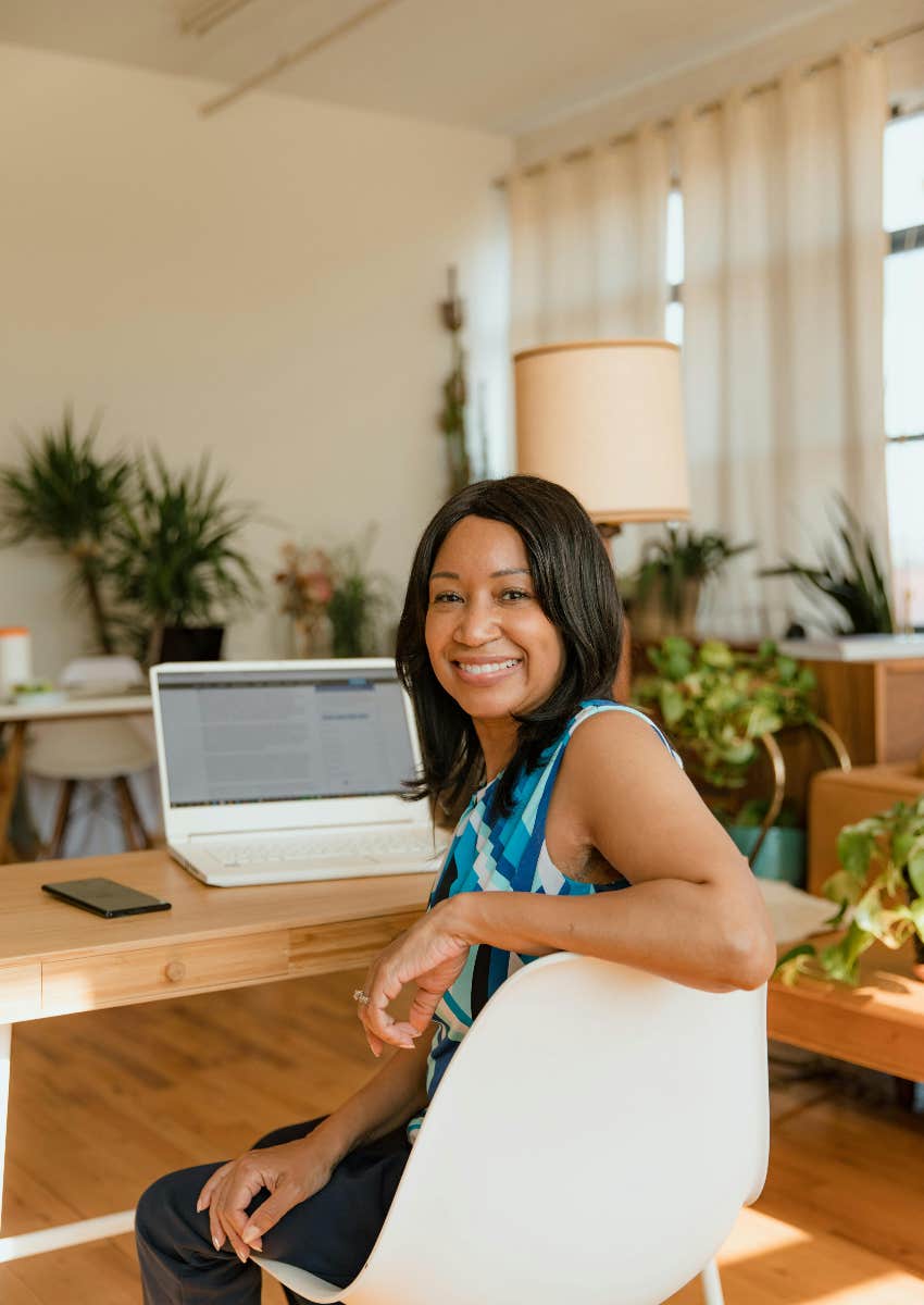 worker who is happy because she gets a paid week off every quarter