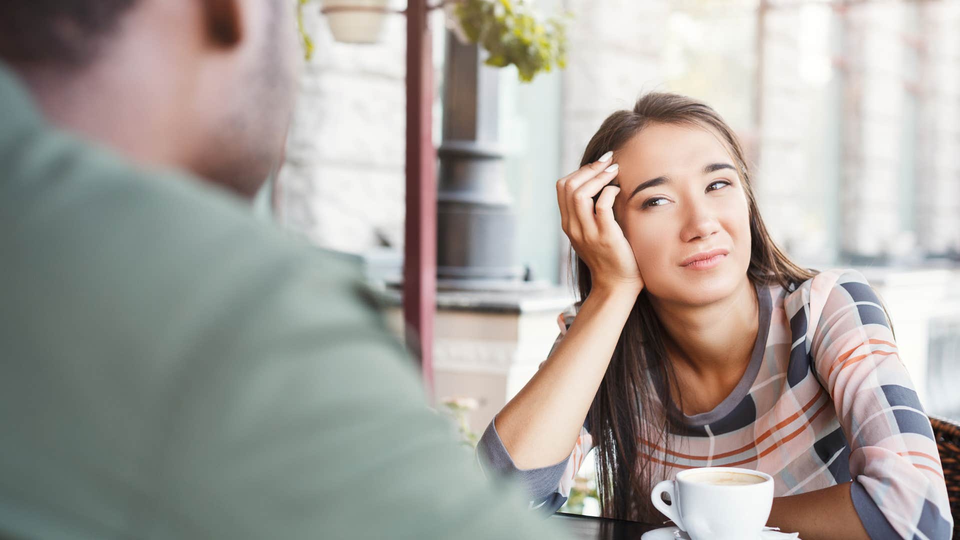 woman in a bad relationship with man who trash talks his ex