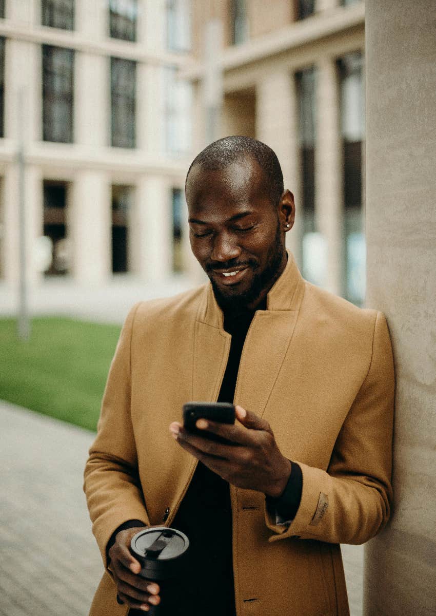 man using a smartphone
