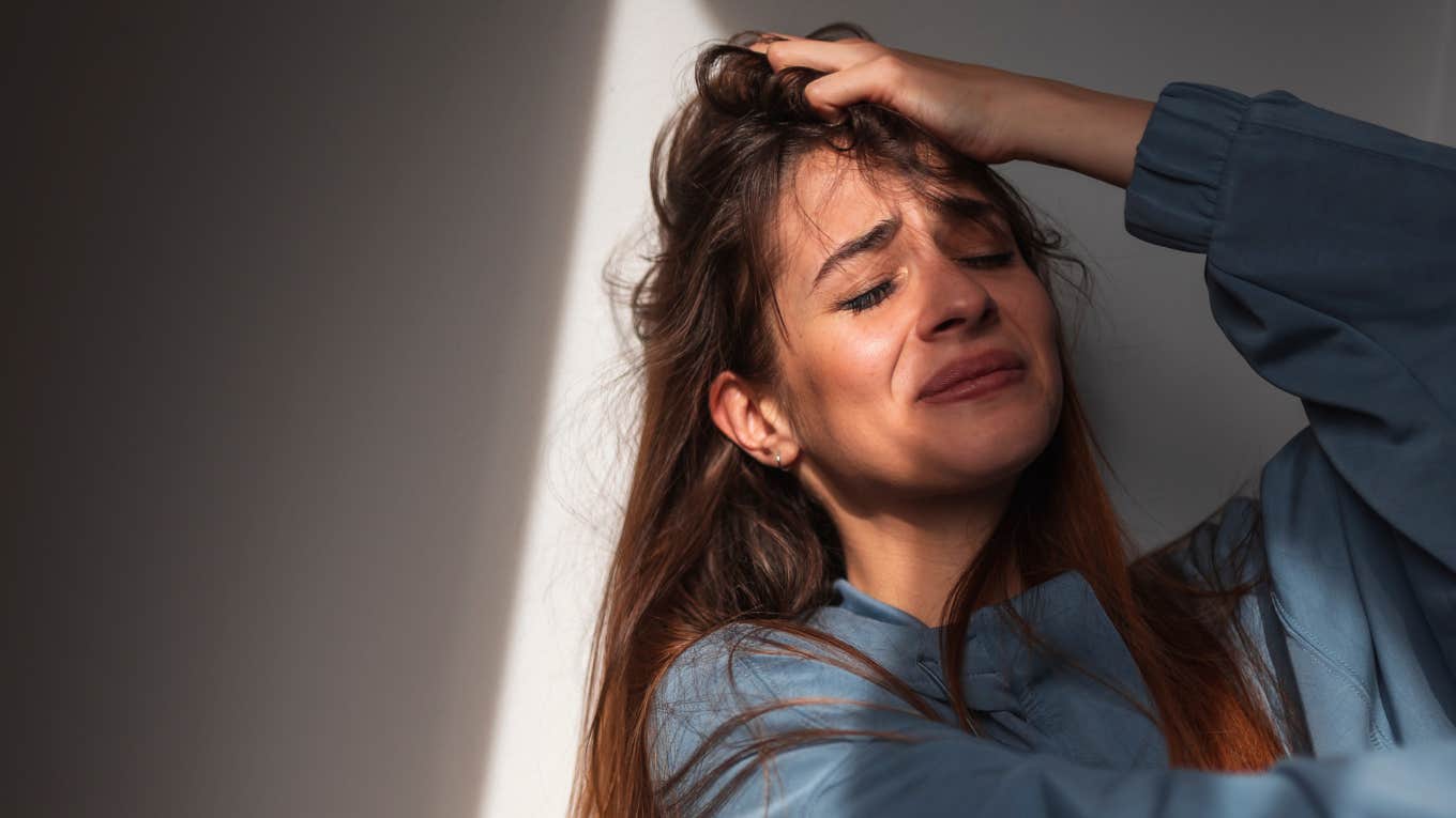 gen z woman sobs student loan interest rate