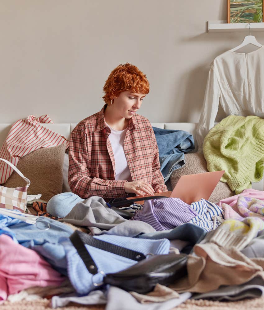 Person on messy bed