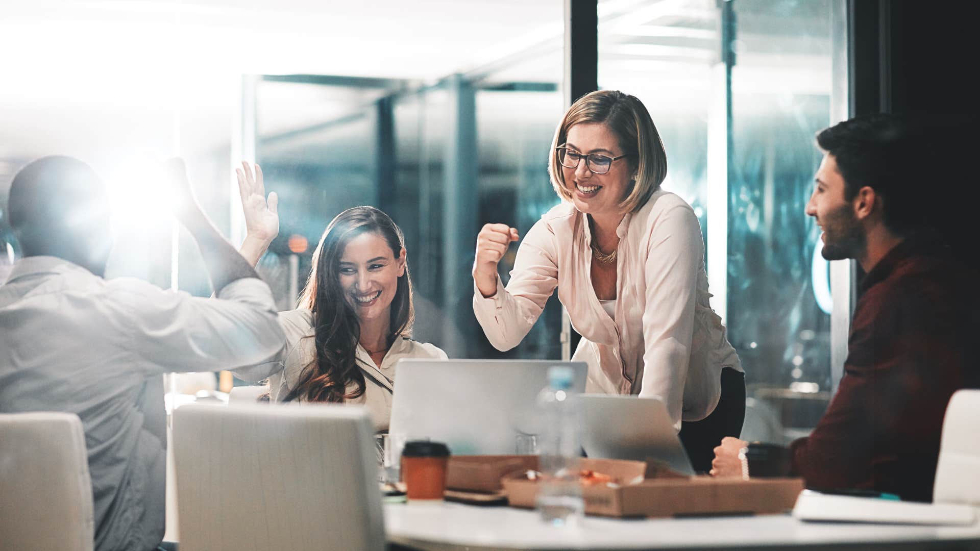woman who is naturally positive as she celebrates success