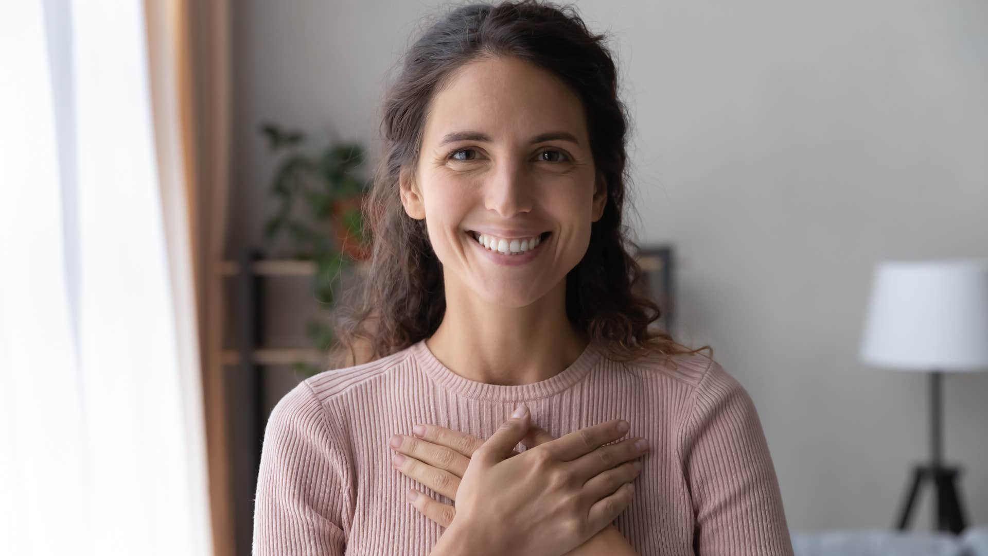 woman who is naturally positive as she expresses gratitude