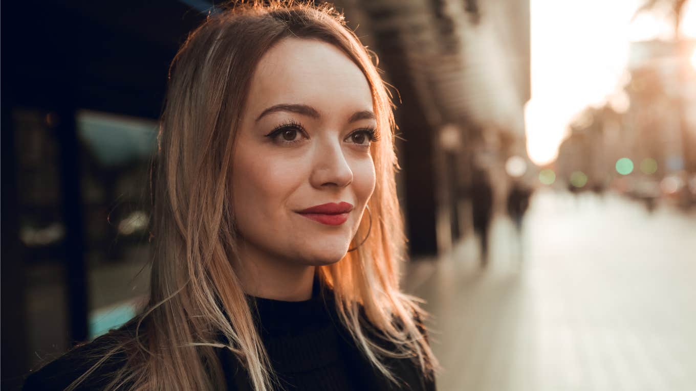 happy woman thinking about her good life