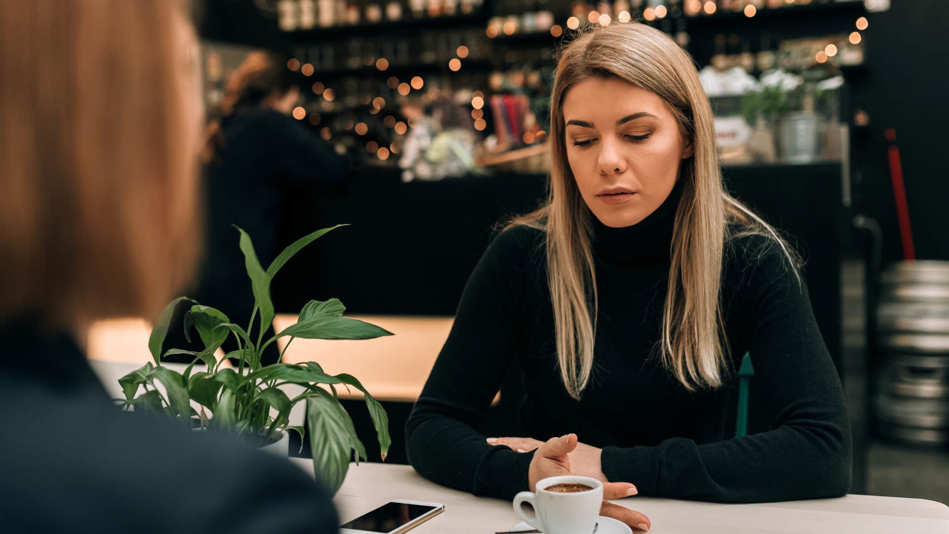 woman talking to friend who's always playing the victim