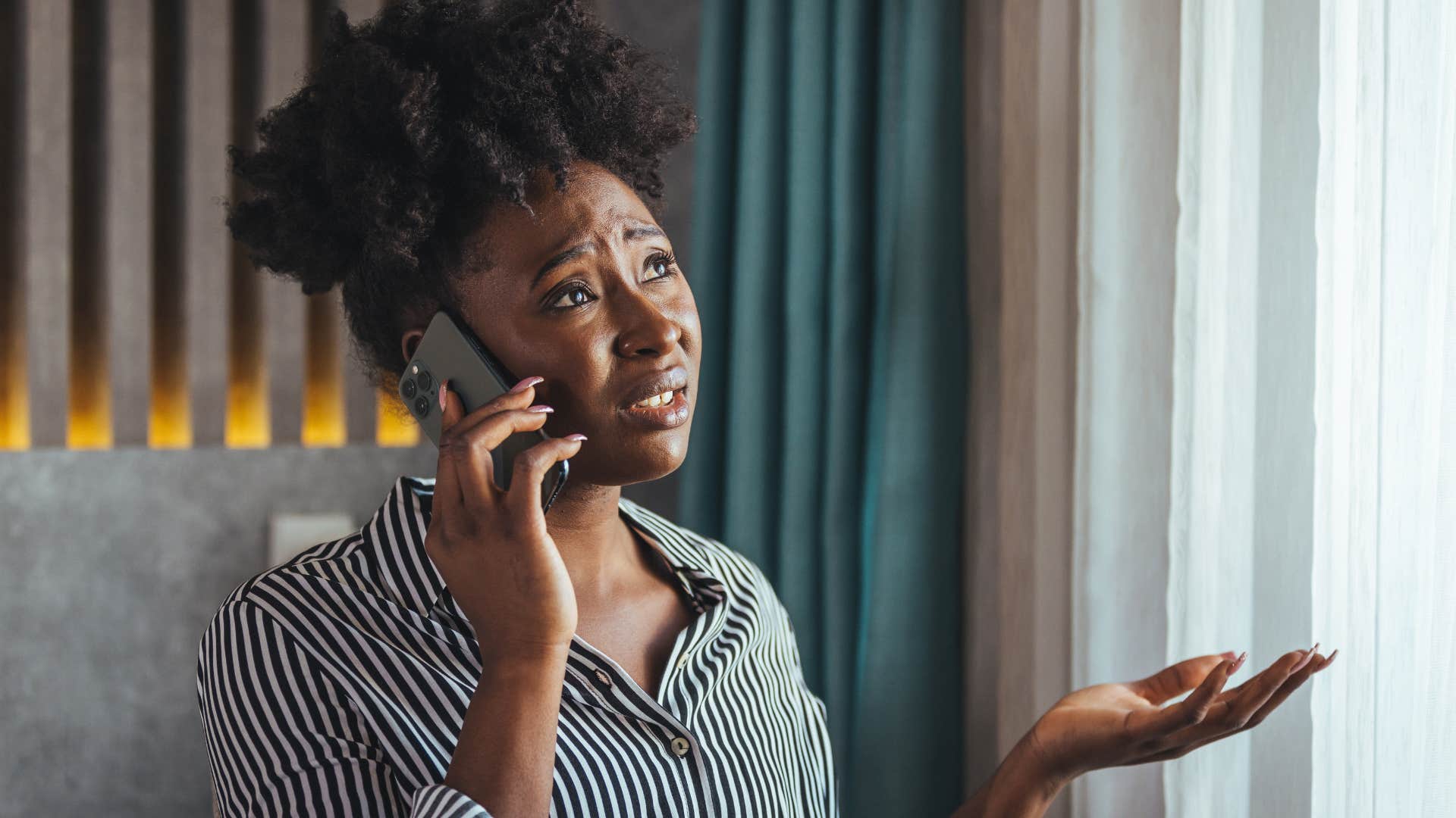 woman who's a chronic complainer talking on the phone