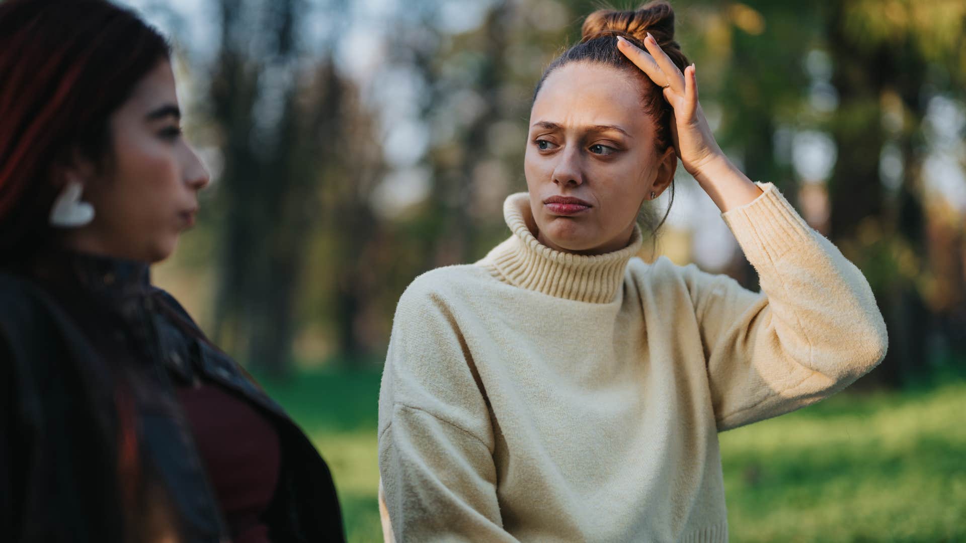 woman exhausted from talking to friend who's an energy vampire