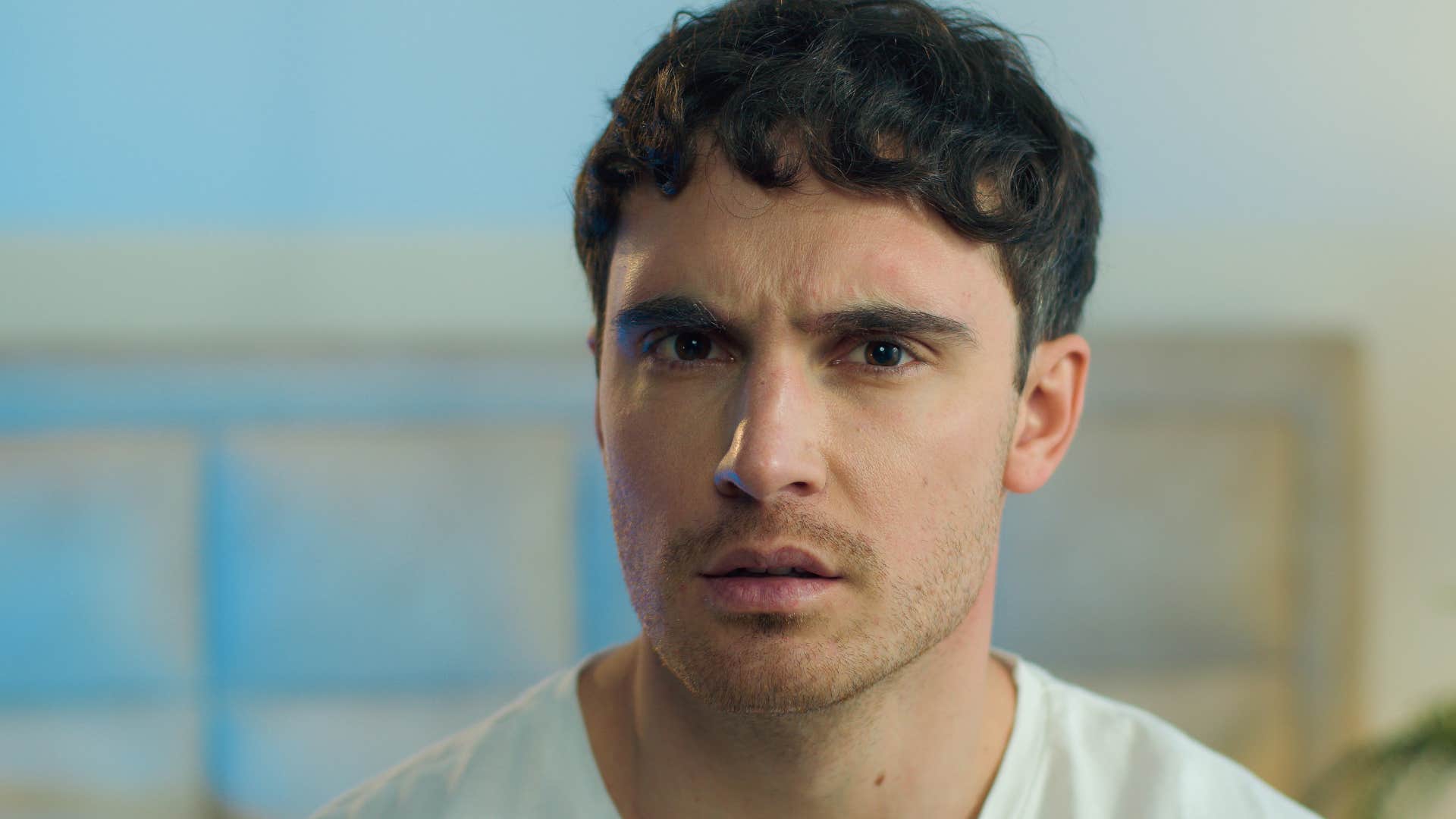 condescending man looking annoyed