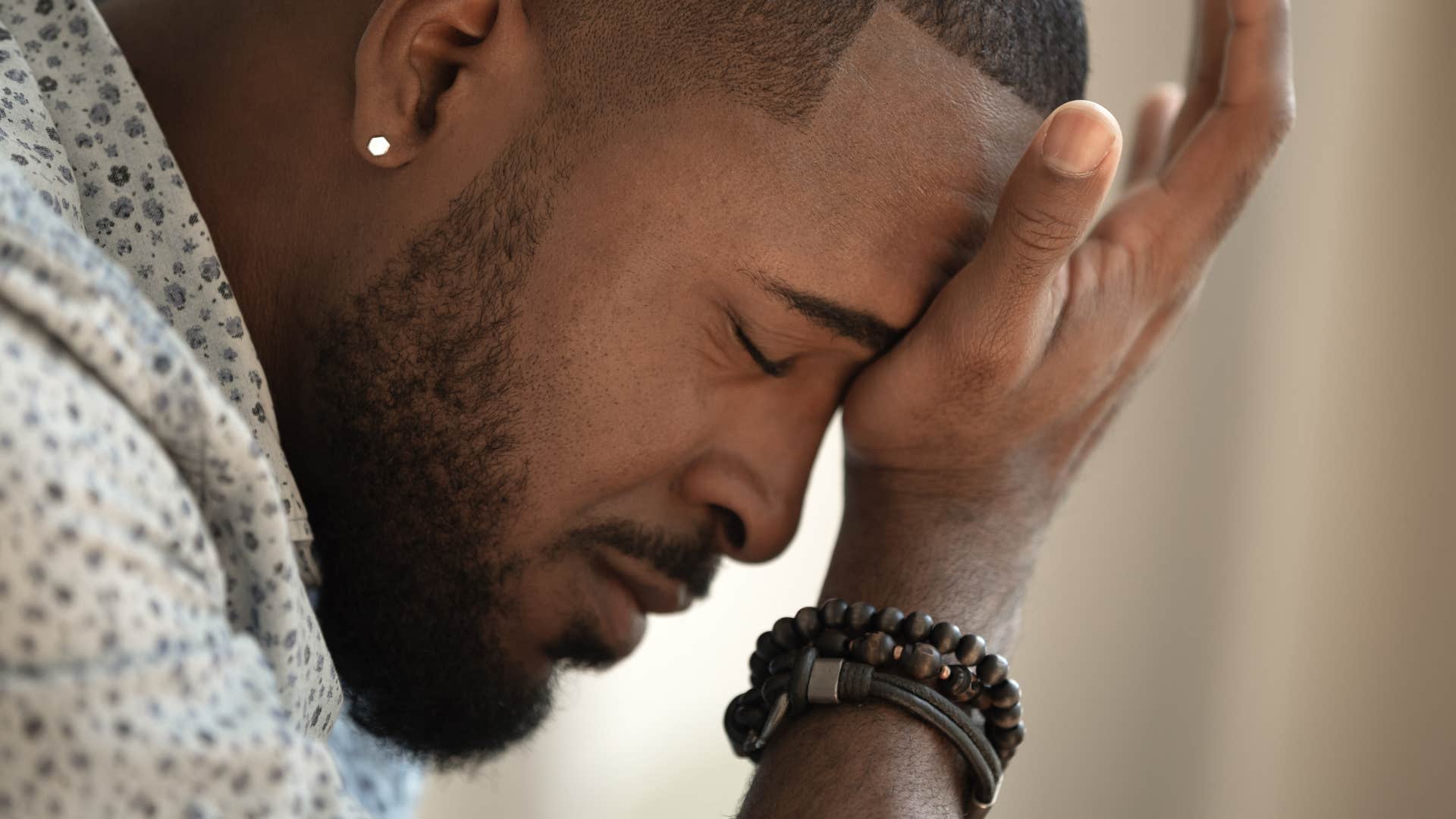 sad distraught man grieving the end of his marriage