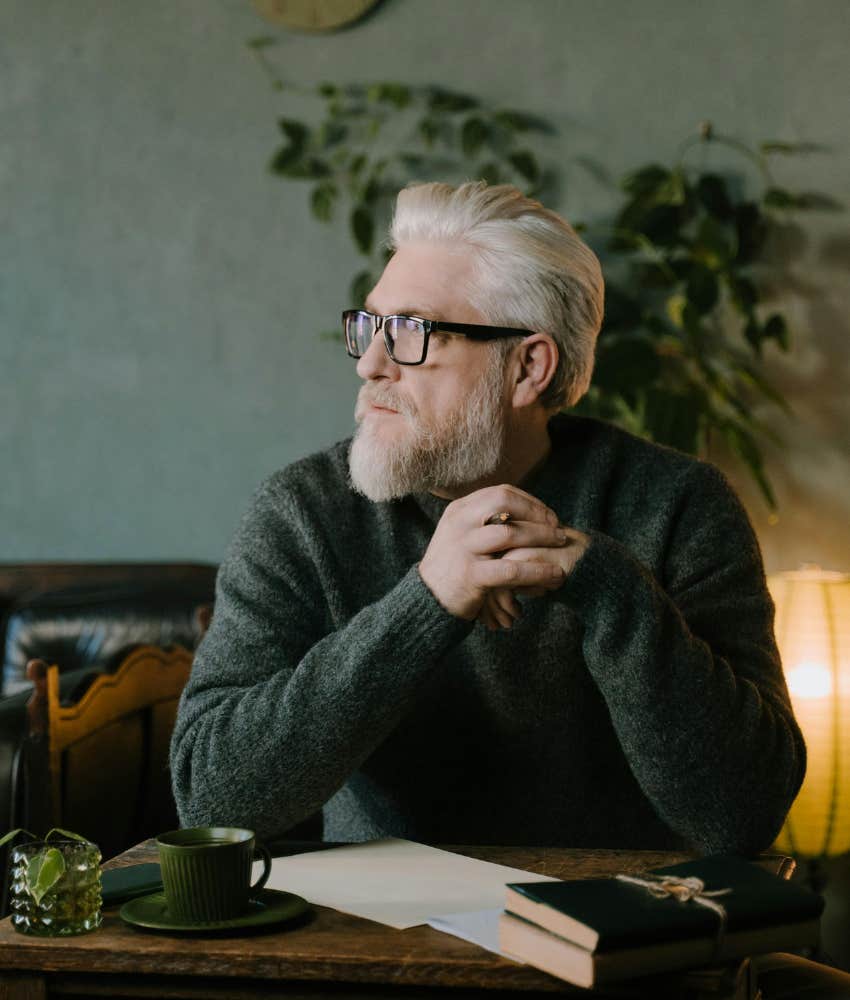 man journaling hobbies emotionally intelligent people find enjoyable