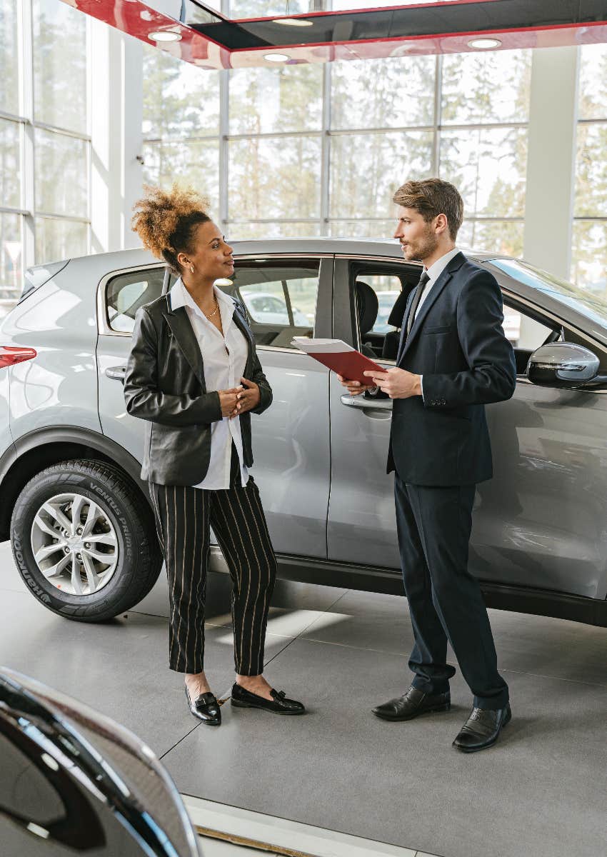 woman shopping for a new car