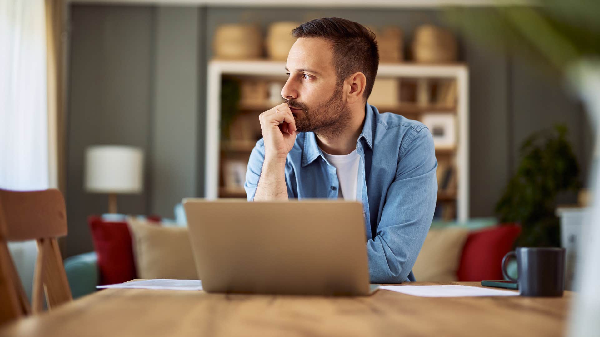 man thinking about his past and avoiding the future