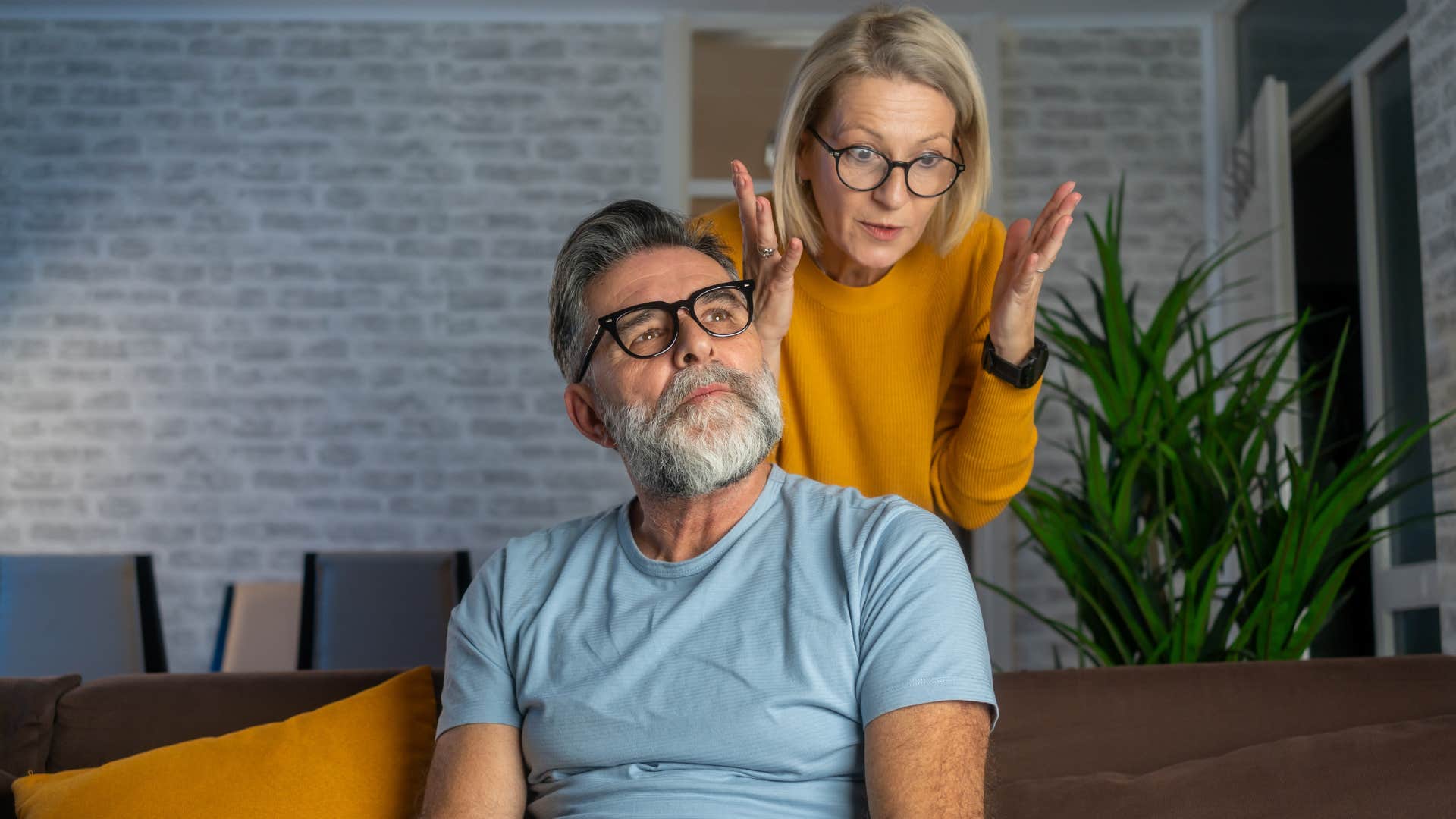 Man who avoids quality time turned away from his wife.