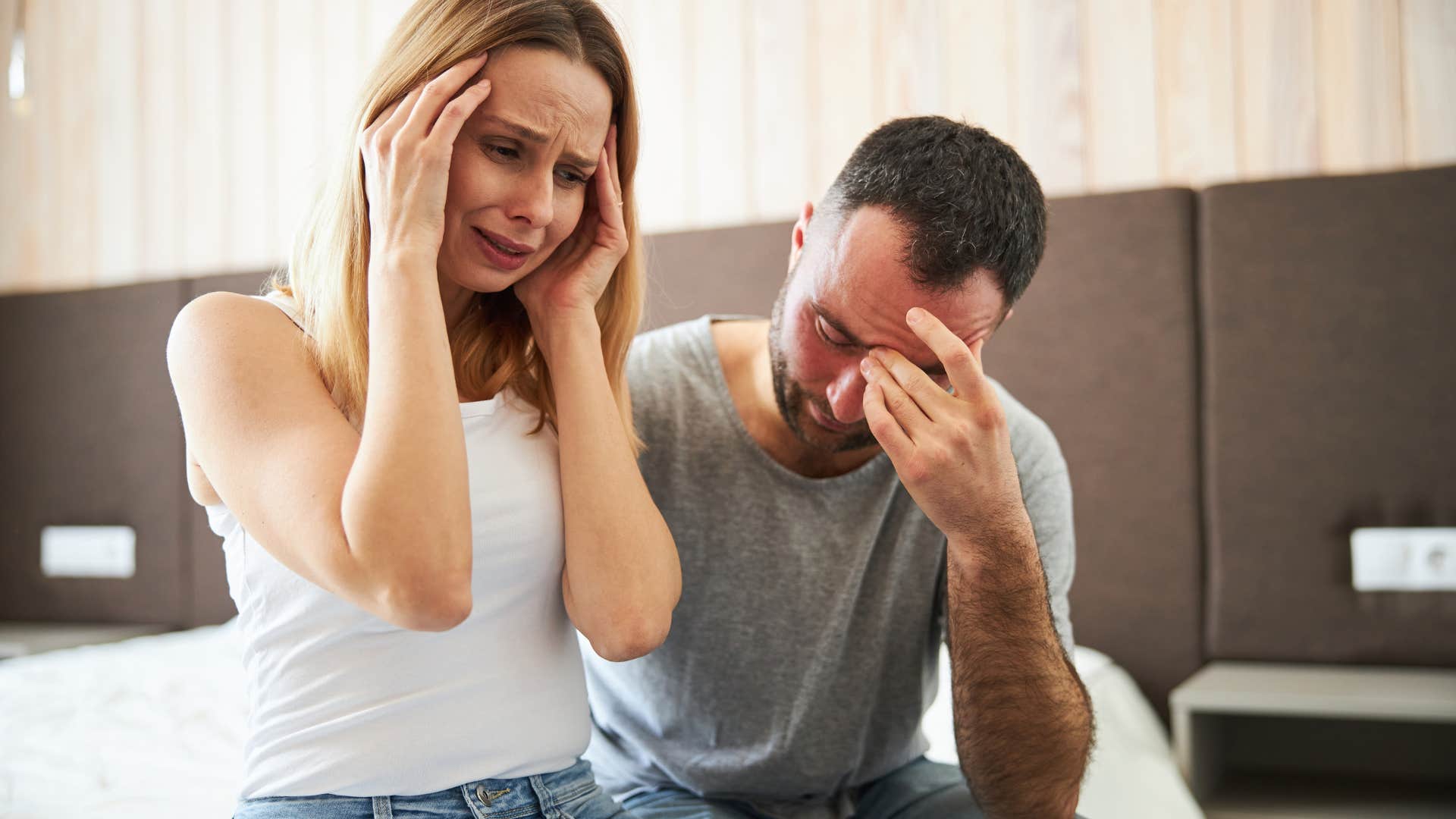 man telling upset wife shes being too sensitive