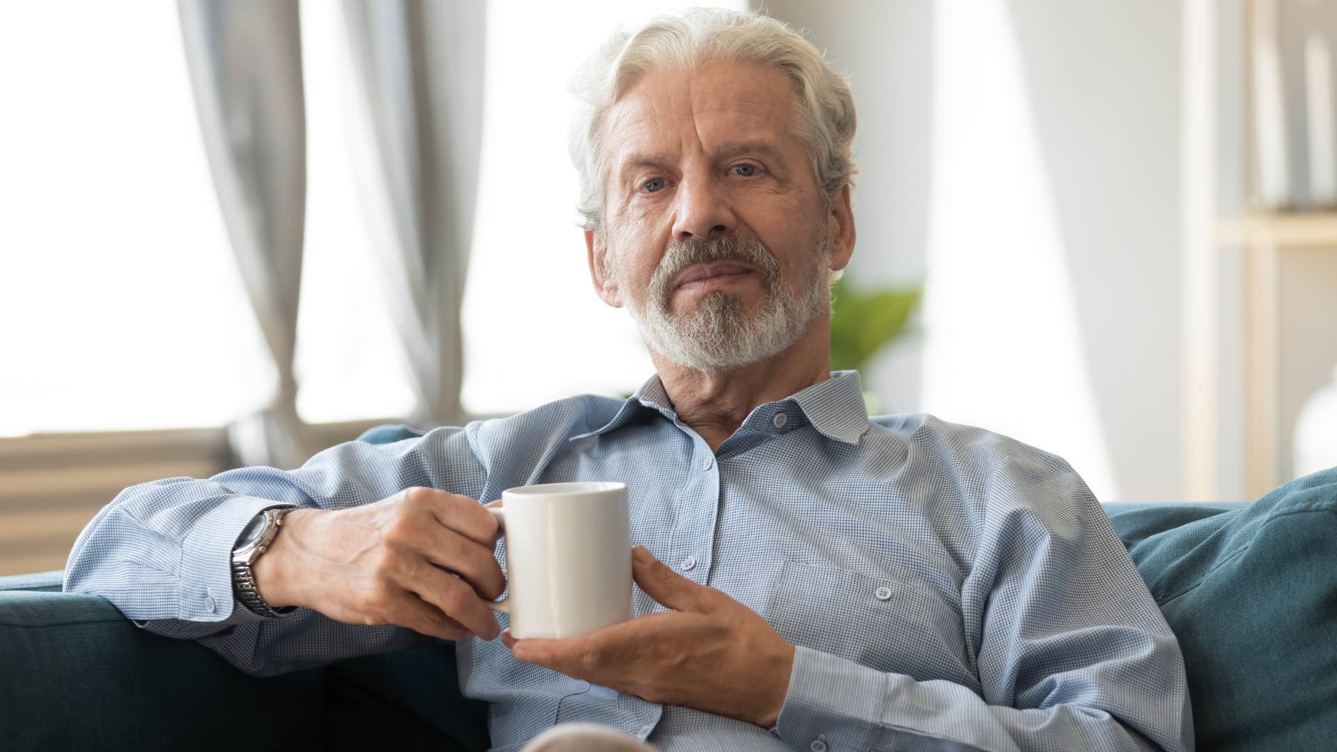 man frustrated thinking his wife sleeps in so late