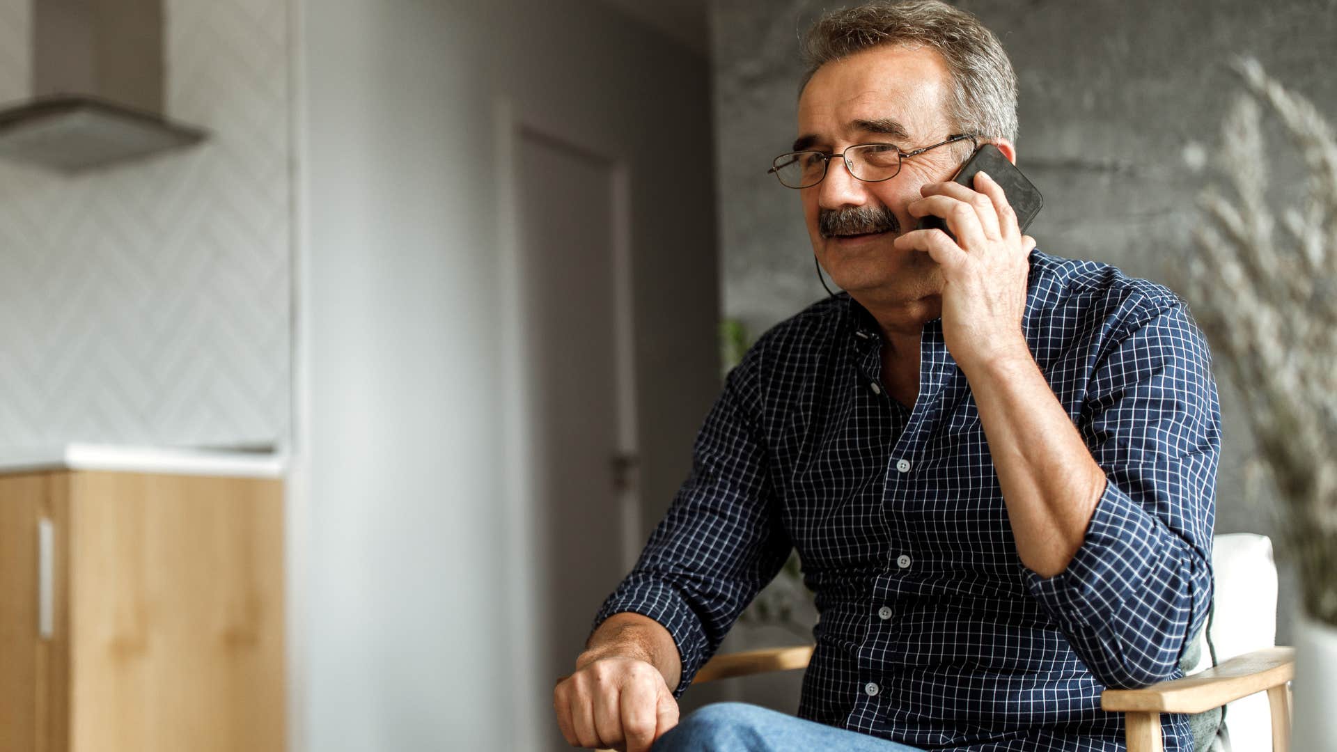 good man on the phone offering his emotional support