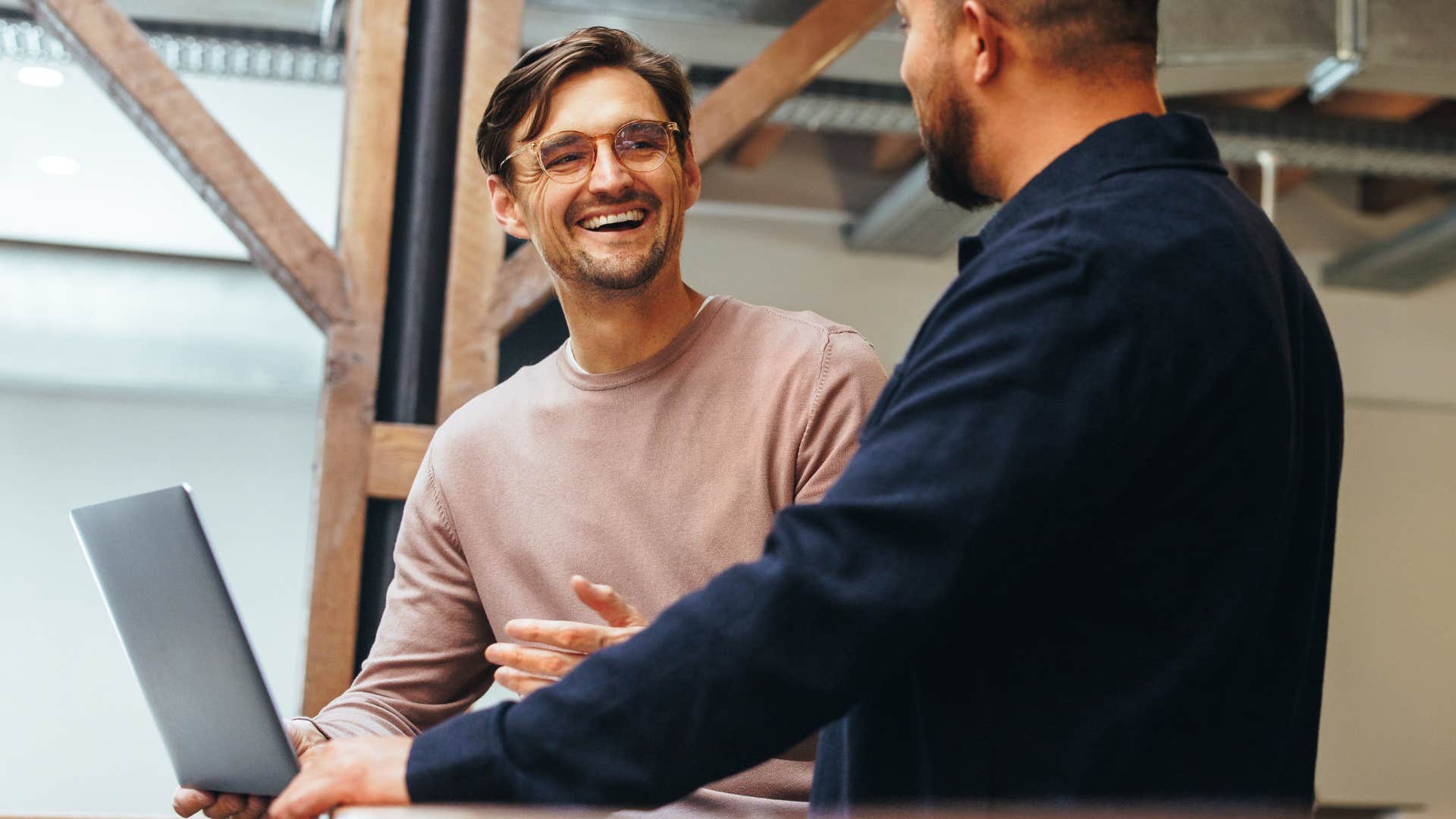 man saying I'm so happy for you to his friend