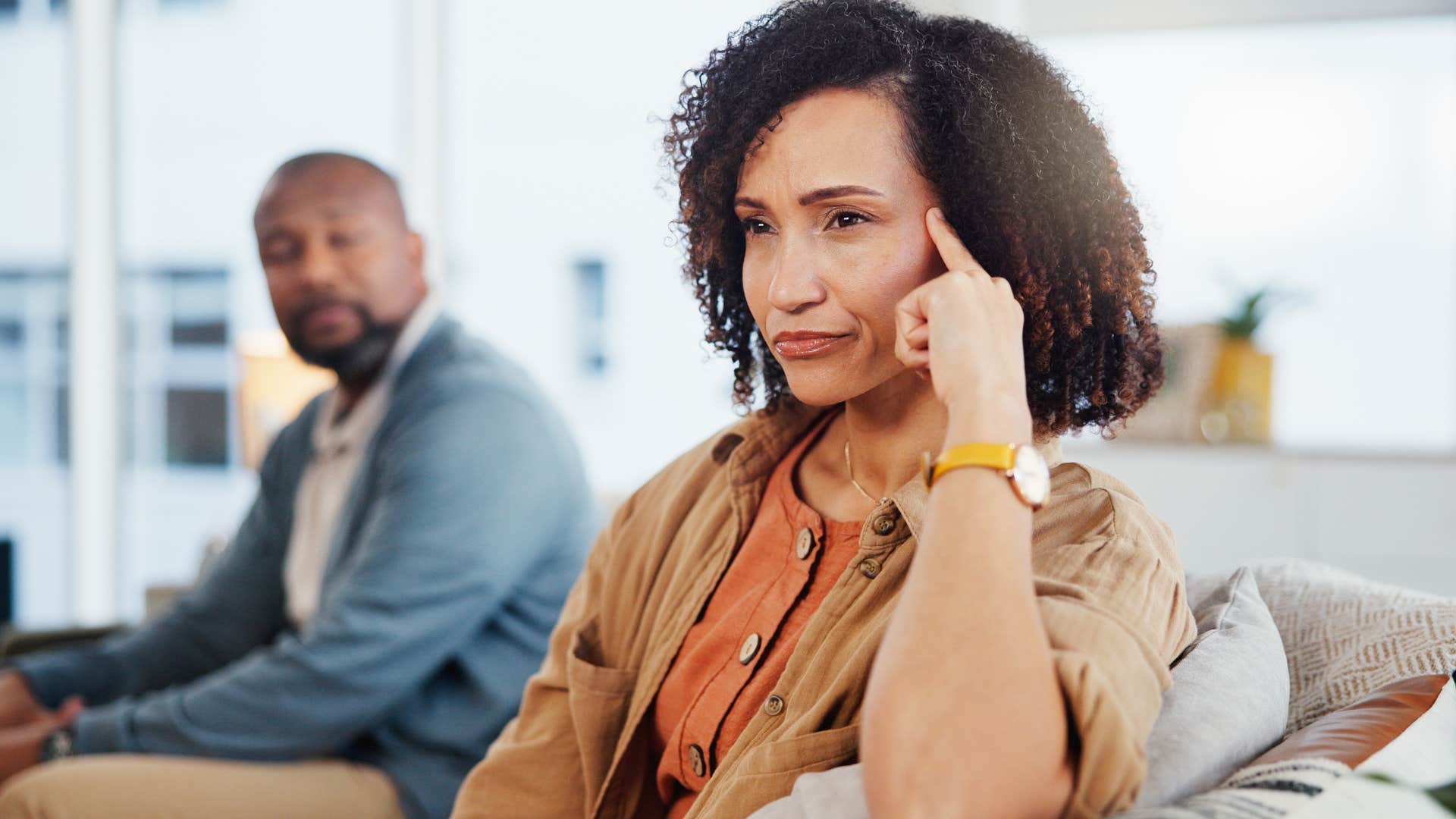 annoyed woman irritated by husband saying i handled it like always