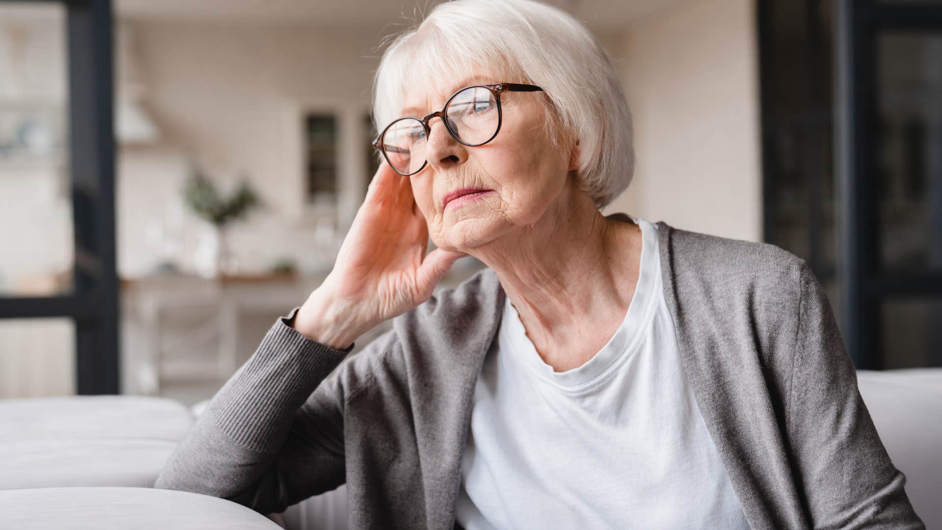 frustrated woman thinking she shouldnt have to ask husband to do something