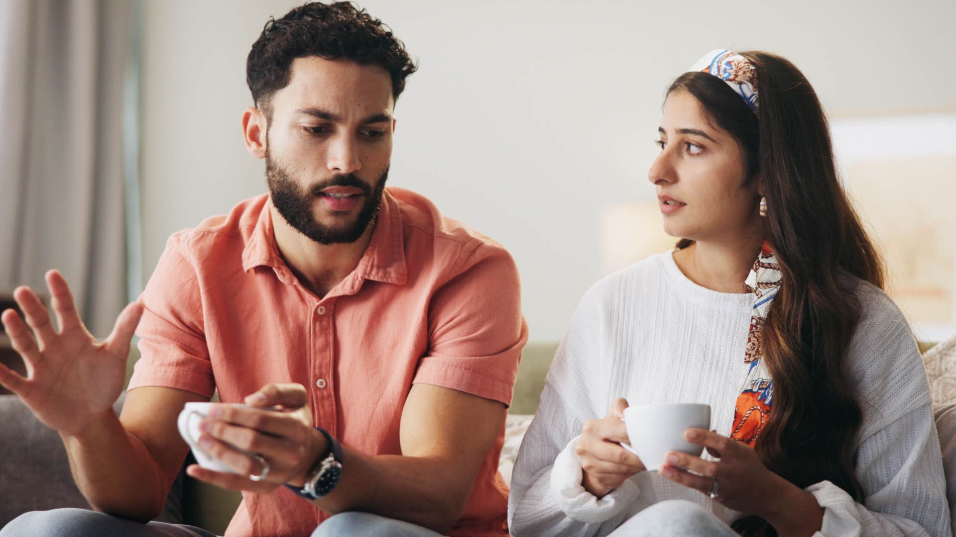 woman expressing concerns with her husband